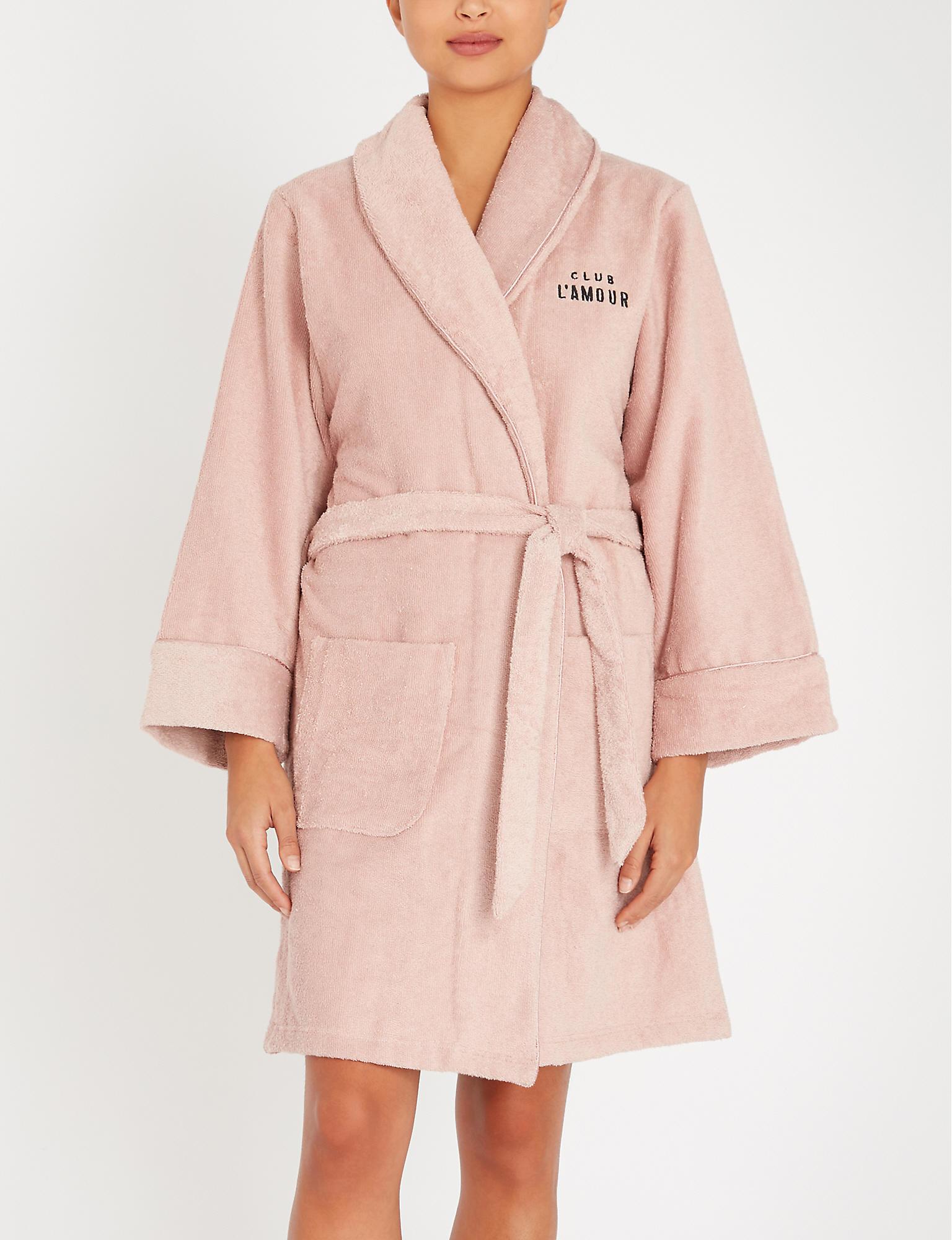 pink towelling bathrobe