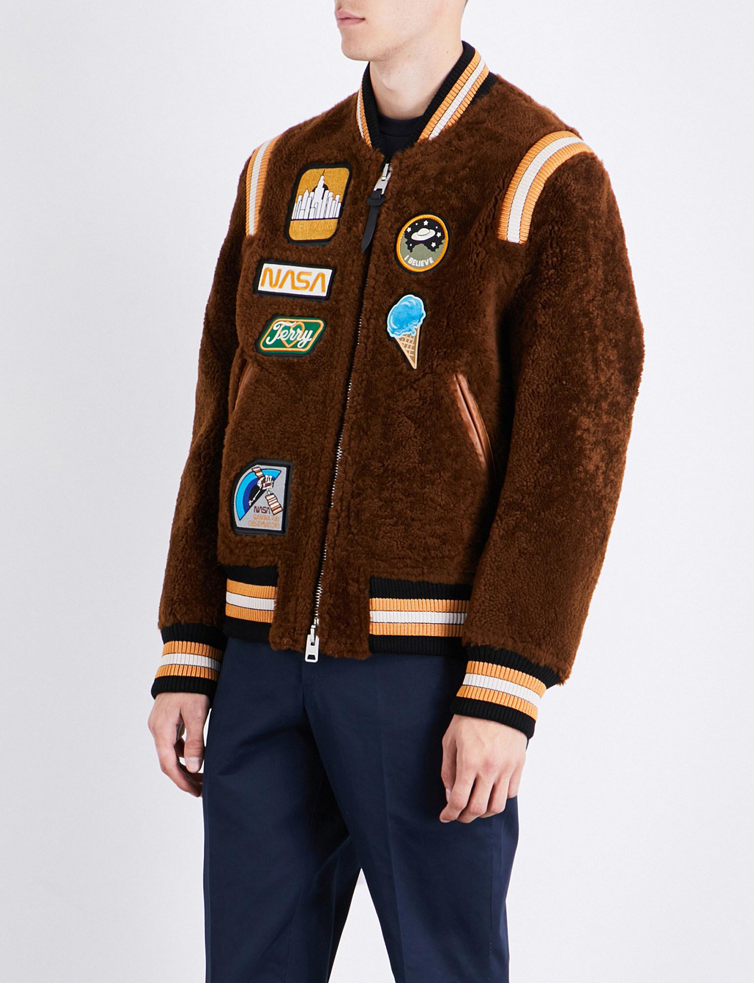COACH Leather Badgedetailed Shearling Varsity Jacket in Light Toffee