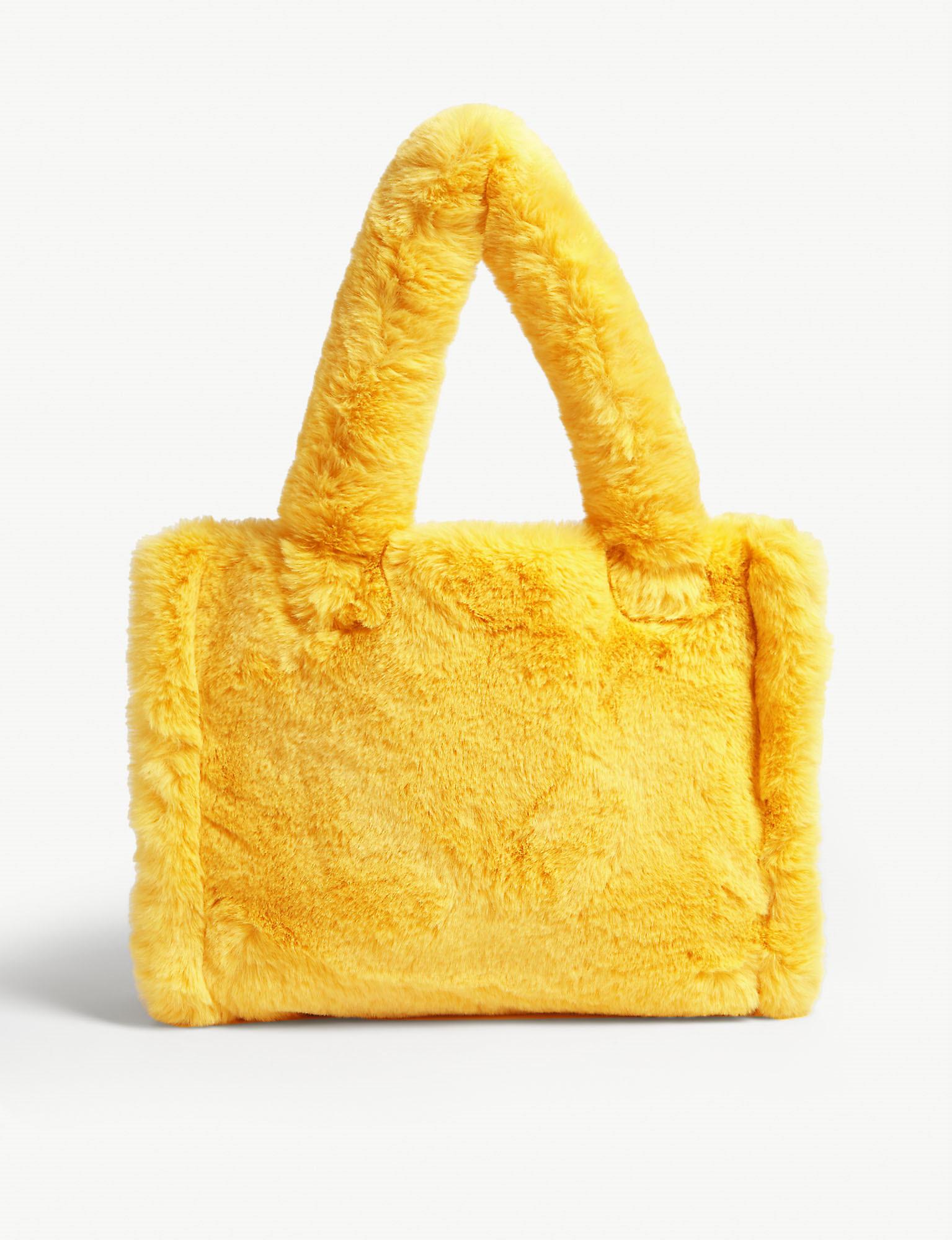 yellow fur bag