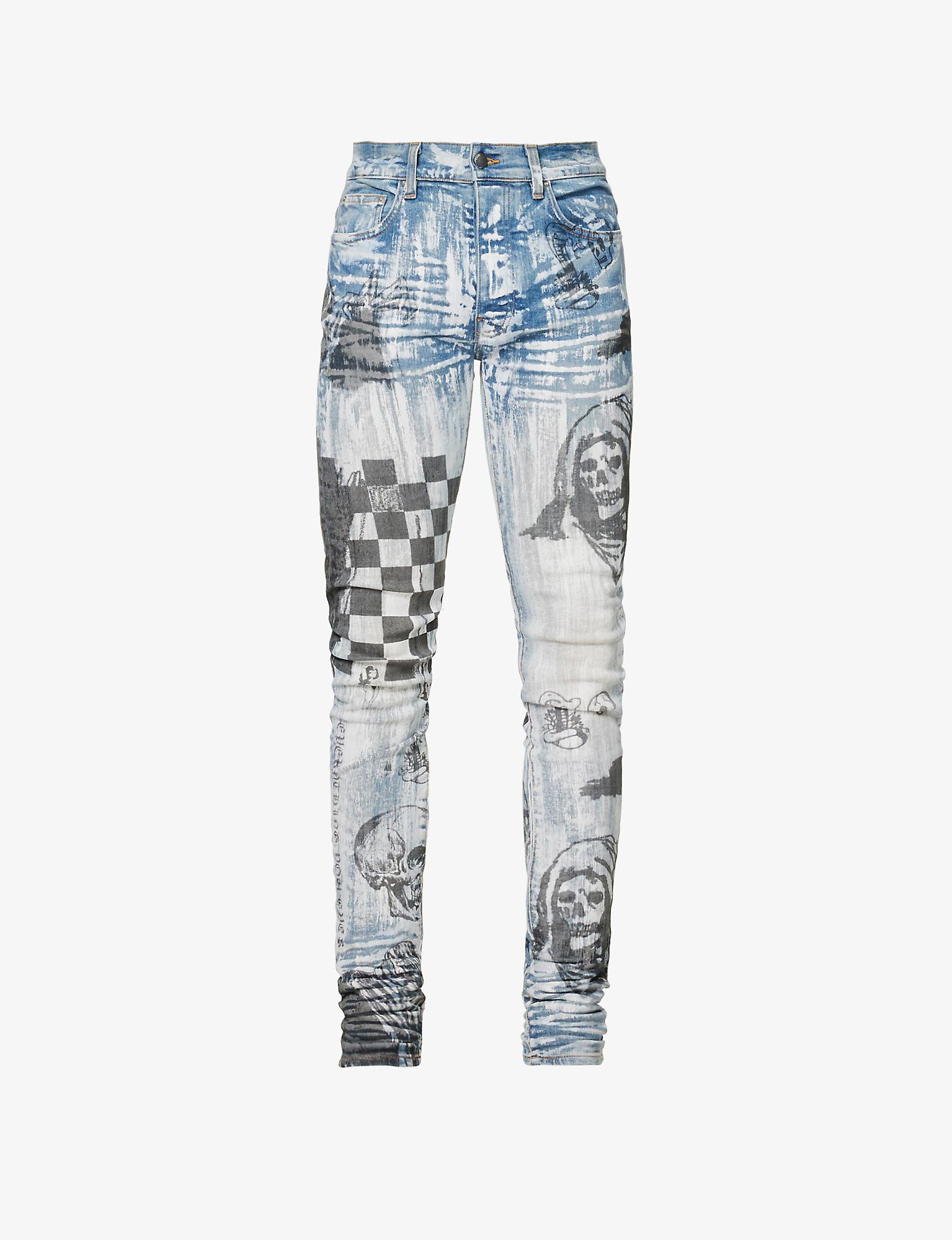 Amiri X Wes Lang Sketch Slimleg Distressed Stretchdenim Jeans in Blue