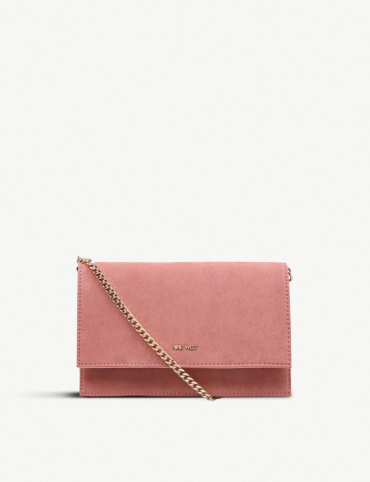 pink suede clutch bag