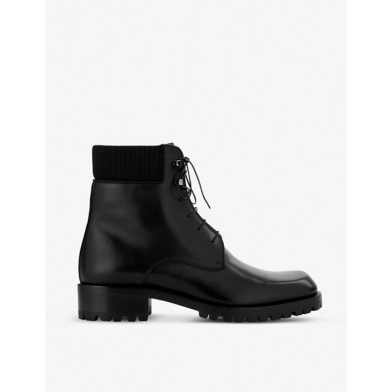 Christian Louboutin Trapman 20 Leather Ankle Boots in Black for