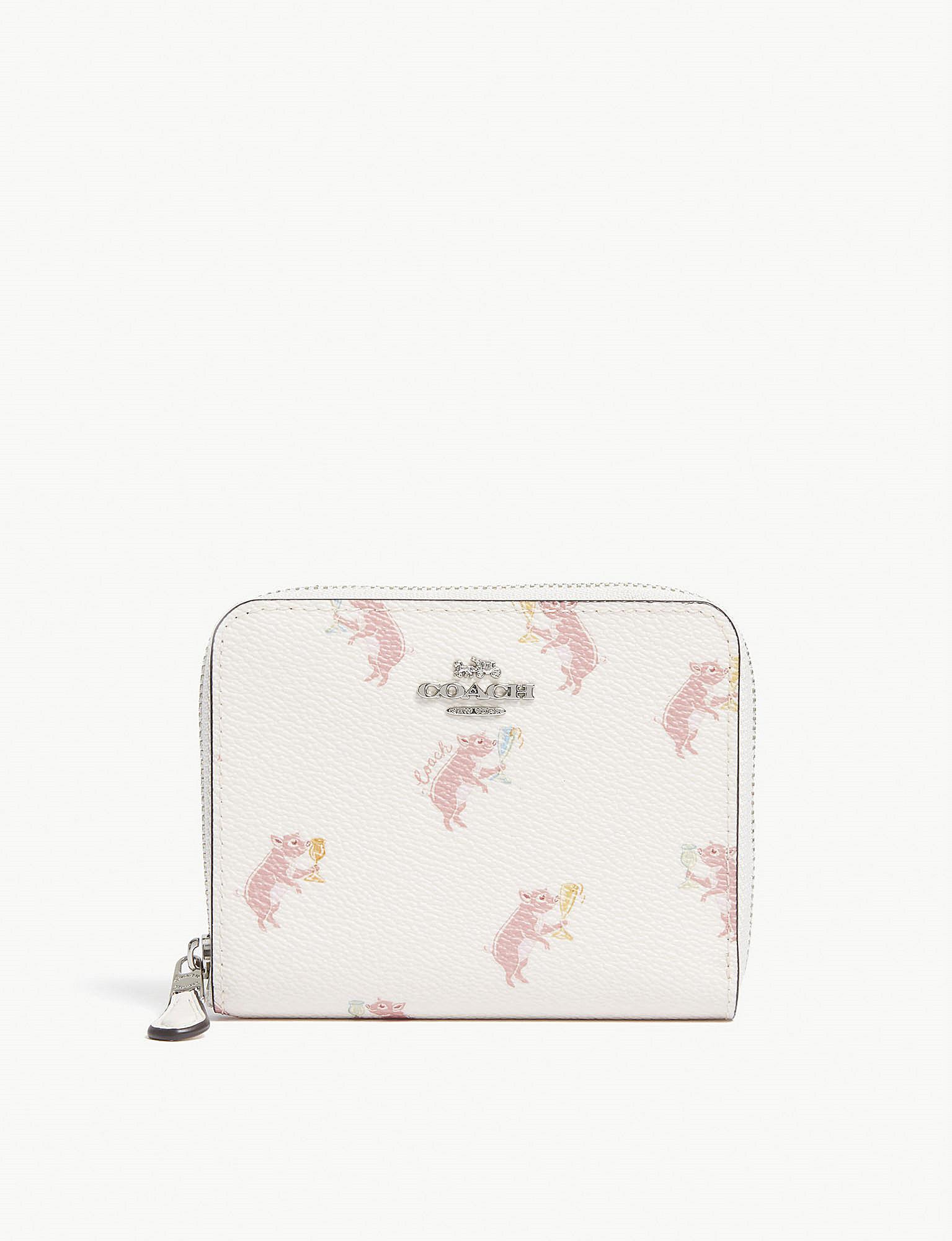 coach pig coin case
