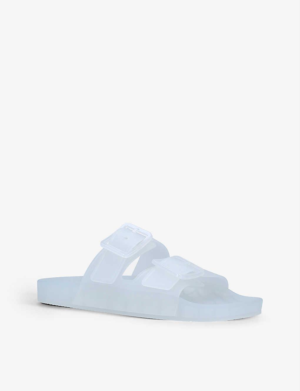 white platform sliders
