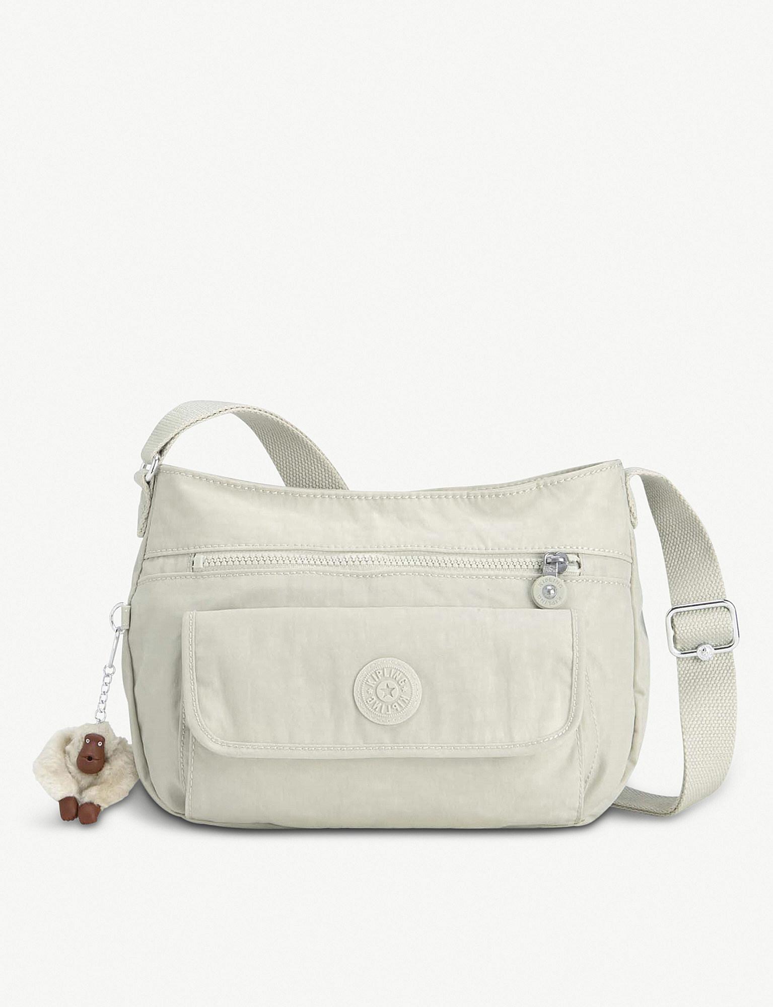 white kipling cross body bag
