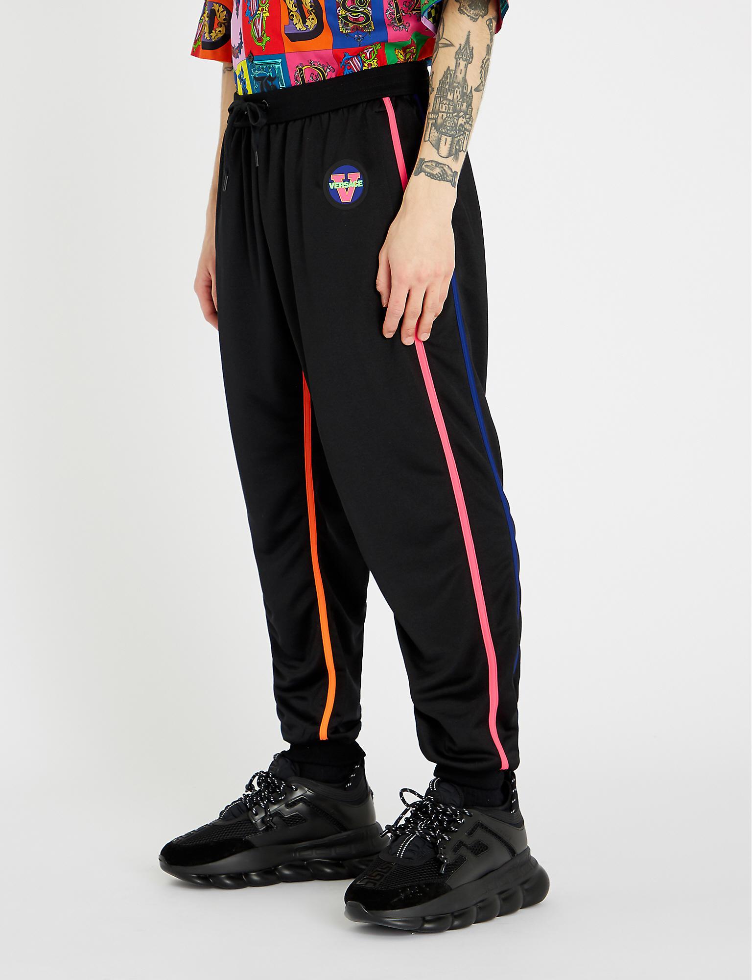 Versace Cotton Relaxed-fit Logo-print Stretch-jersey Tapered jogging ...