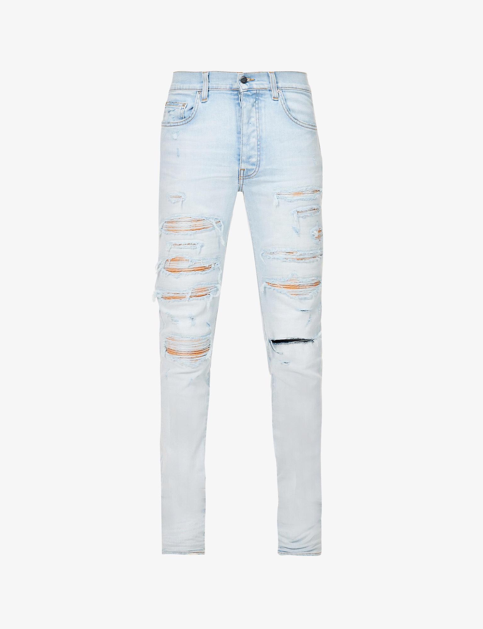 Amiri Thrasher Distressed Slim-fit Stretch-denim Jeans in Light Indigo ...