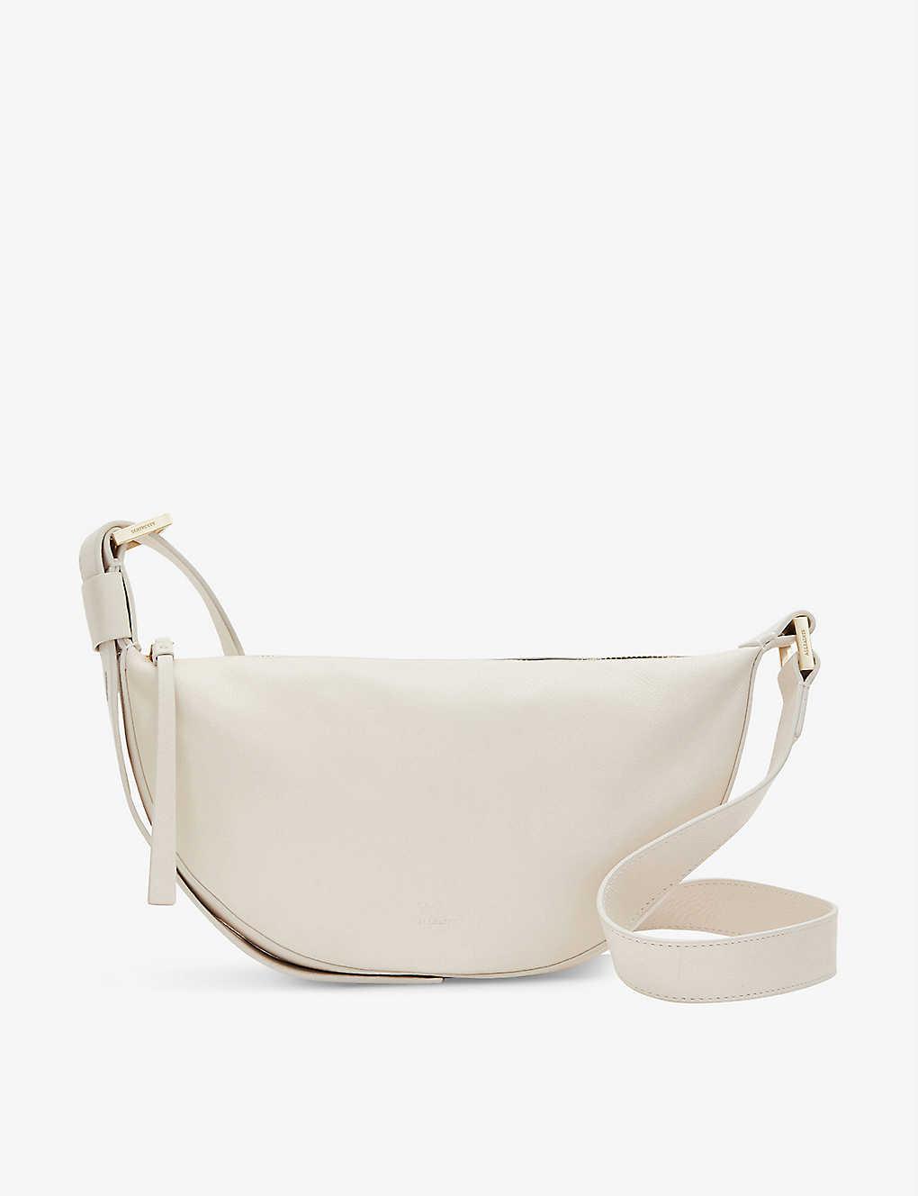 AllSaints Half Moon Leather Cross-body Bag in Natural | Lyst Canada