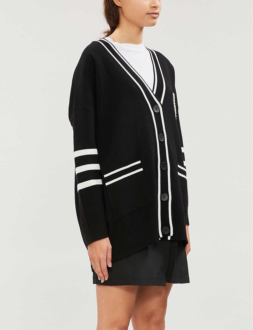 white cardigan with black trim