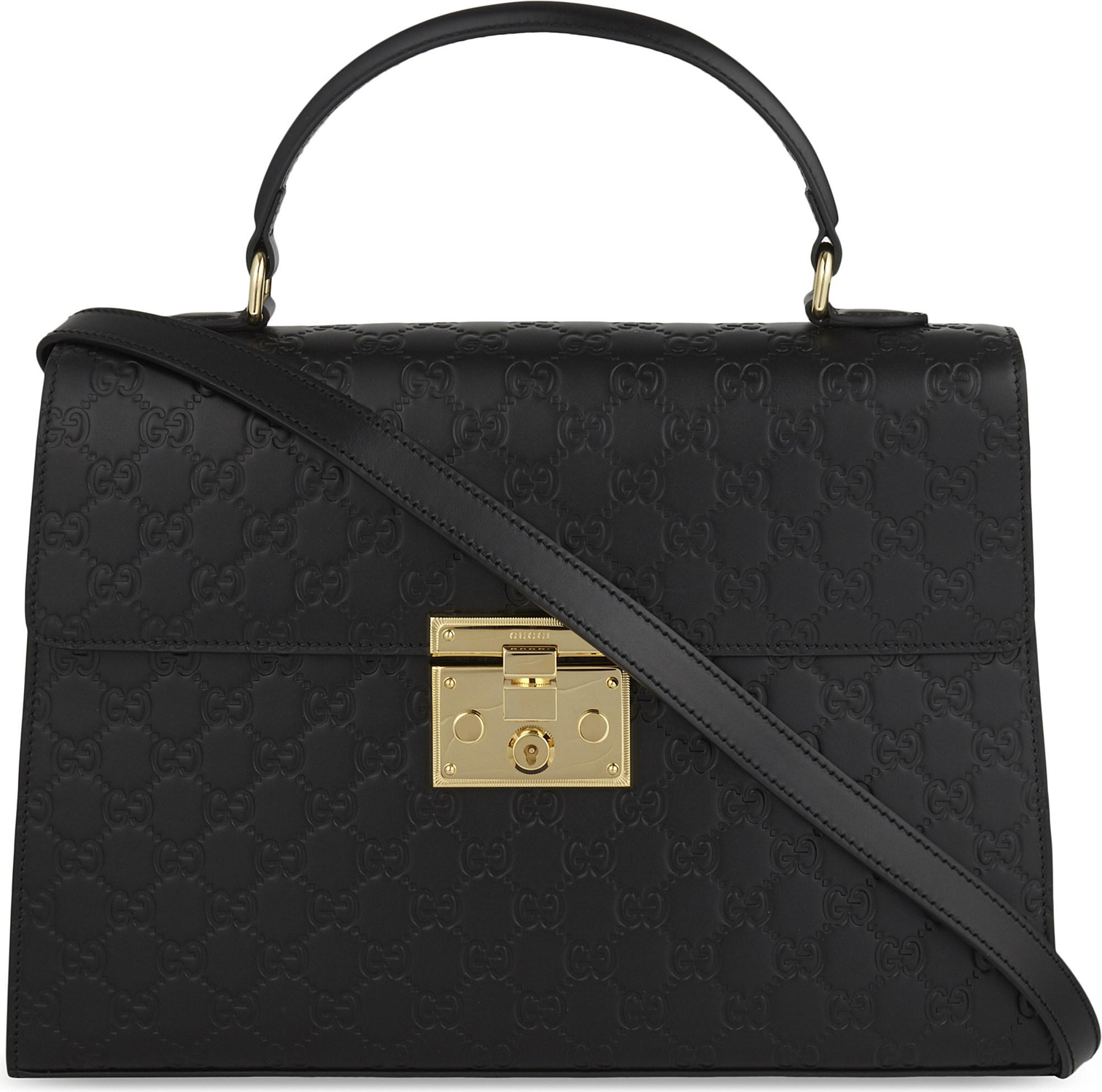 Gucci Embossed Leather Signature 