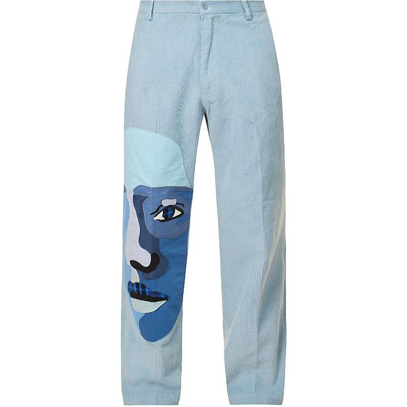 Abstract Face Print Denim Jeans