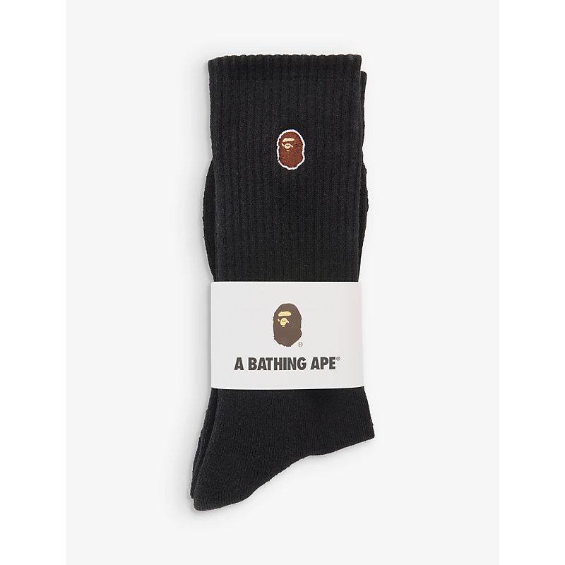 https://cdna.lystit.com/photos/selfridges/e3680d78/a-bathing-ape-BLACK-Ape-head-Brand-embroidered-Cotton-blend-Socks.jpeg