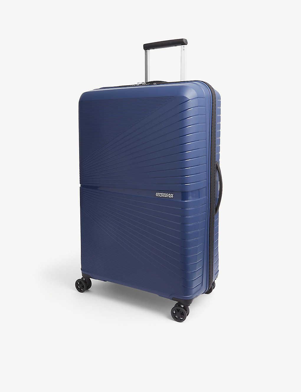 Vejrtrækning Se igennem pastel American Tourister Airconic Four-wheel Shell Suitcase 77cm in Blue | Lyst