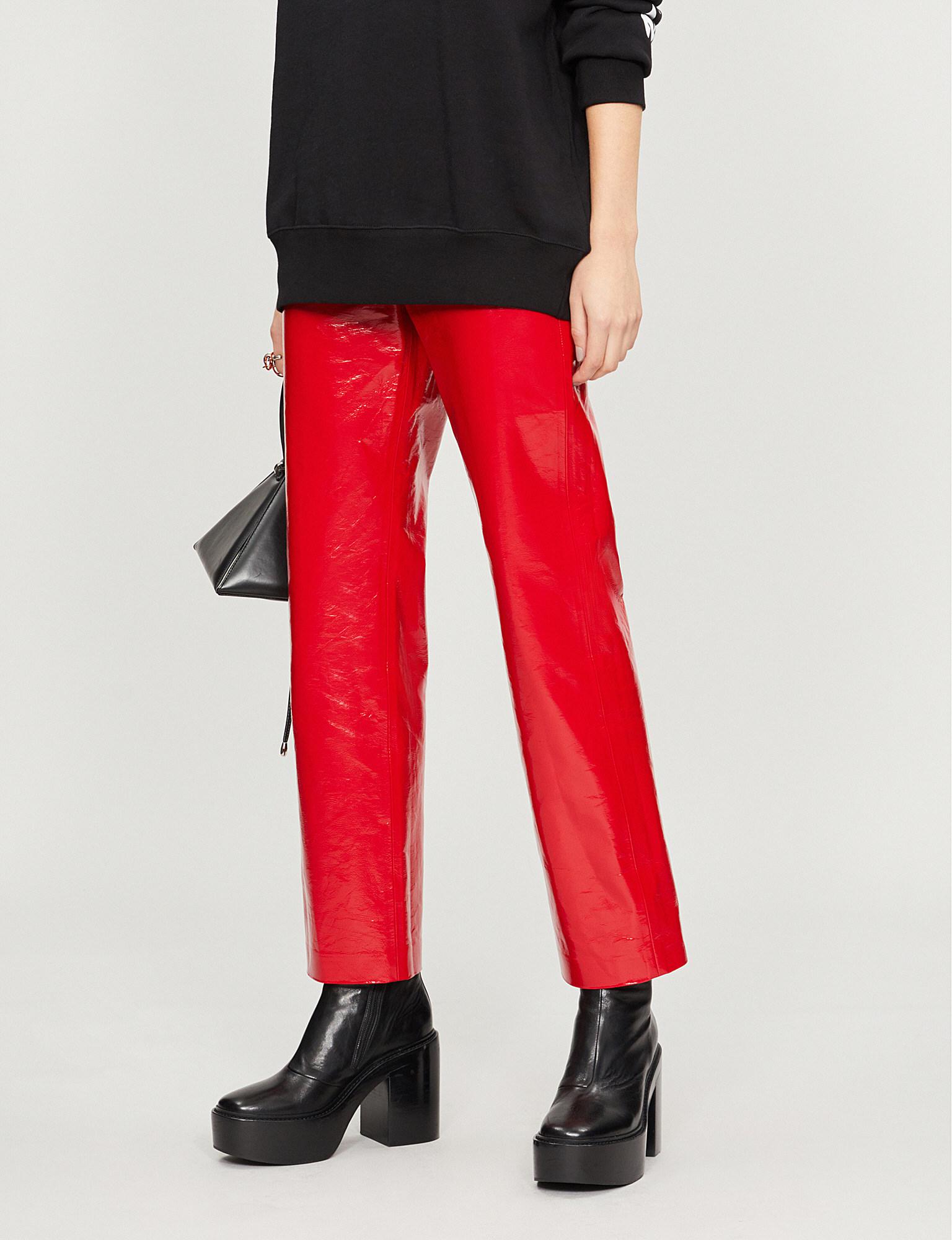 red faux leather trousers