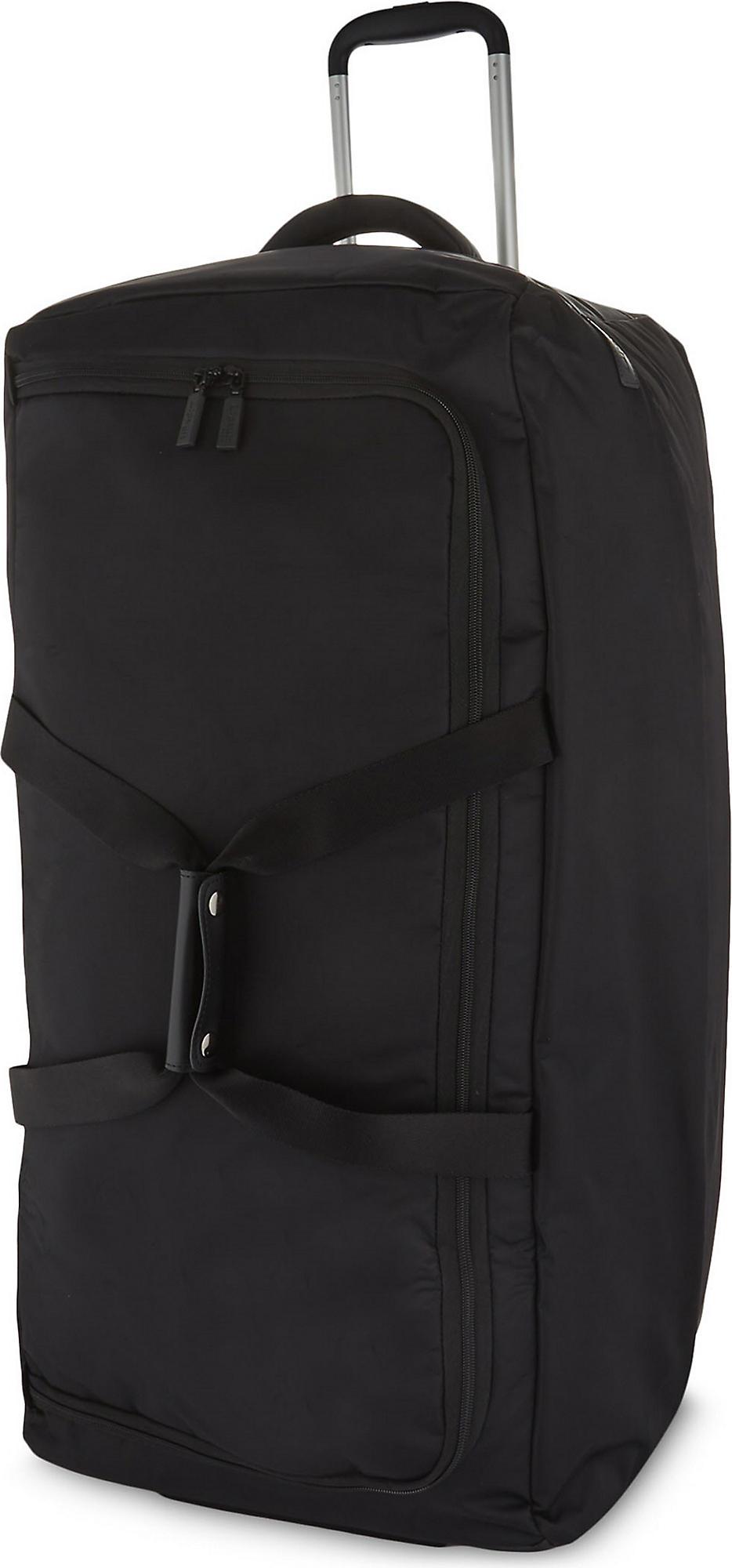 Lipault Synthetic Foldable Wheeled Duffel Bag 78cm in Black for Men Lyst