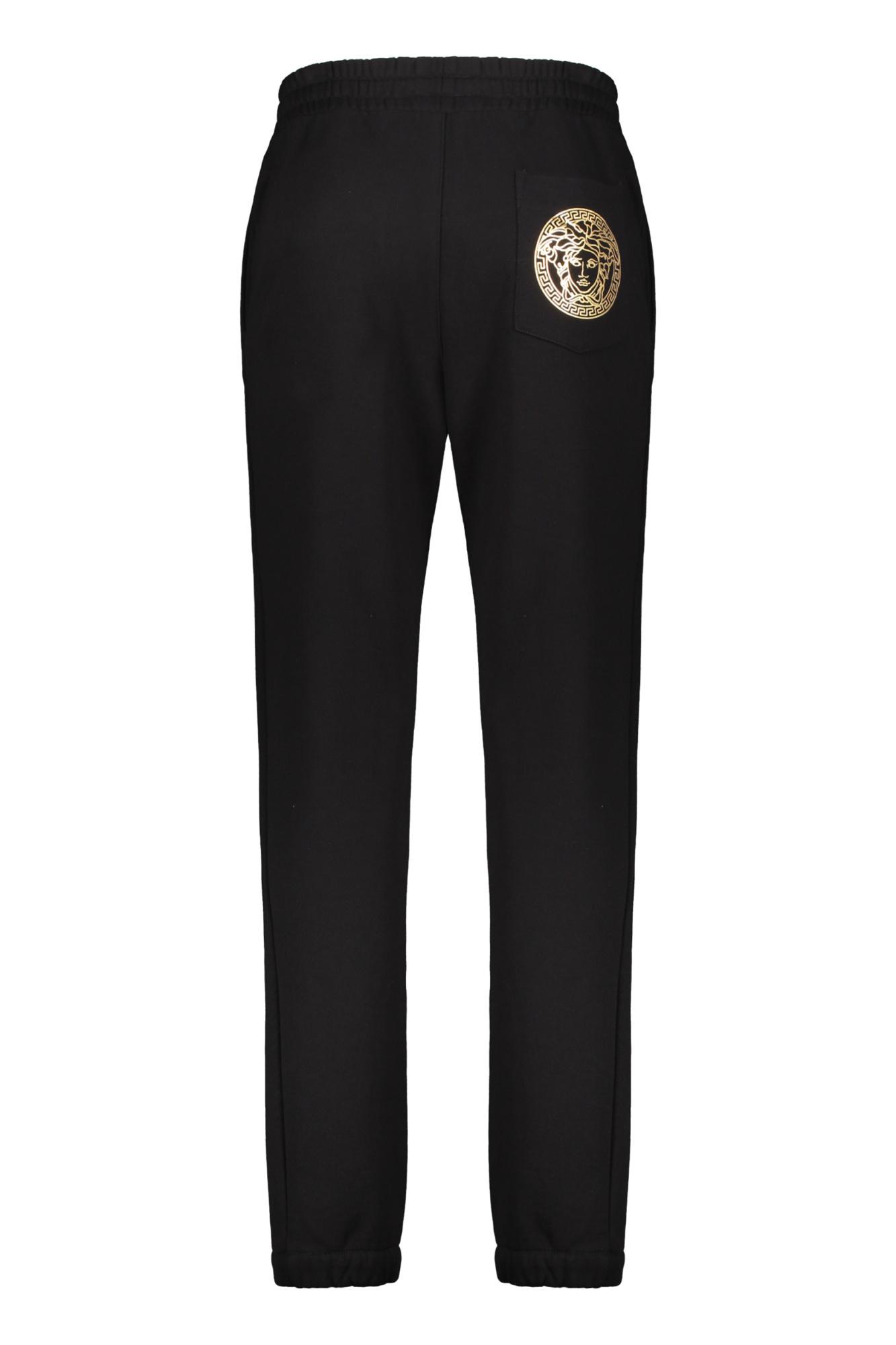 パンツ VERSACE JOGGING PANTS WITH LOGO V-Emblem Sweatpants | VERSACE US