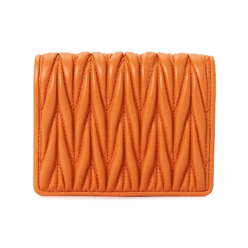 Miu Miu Matelassé Logo Wallet in Orange | Lyst