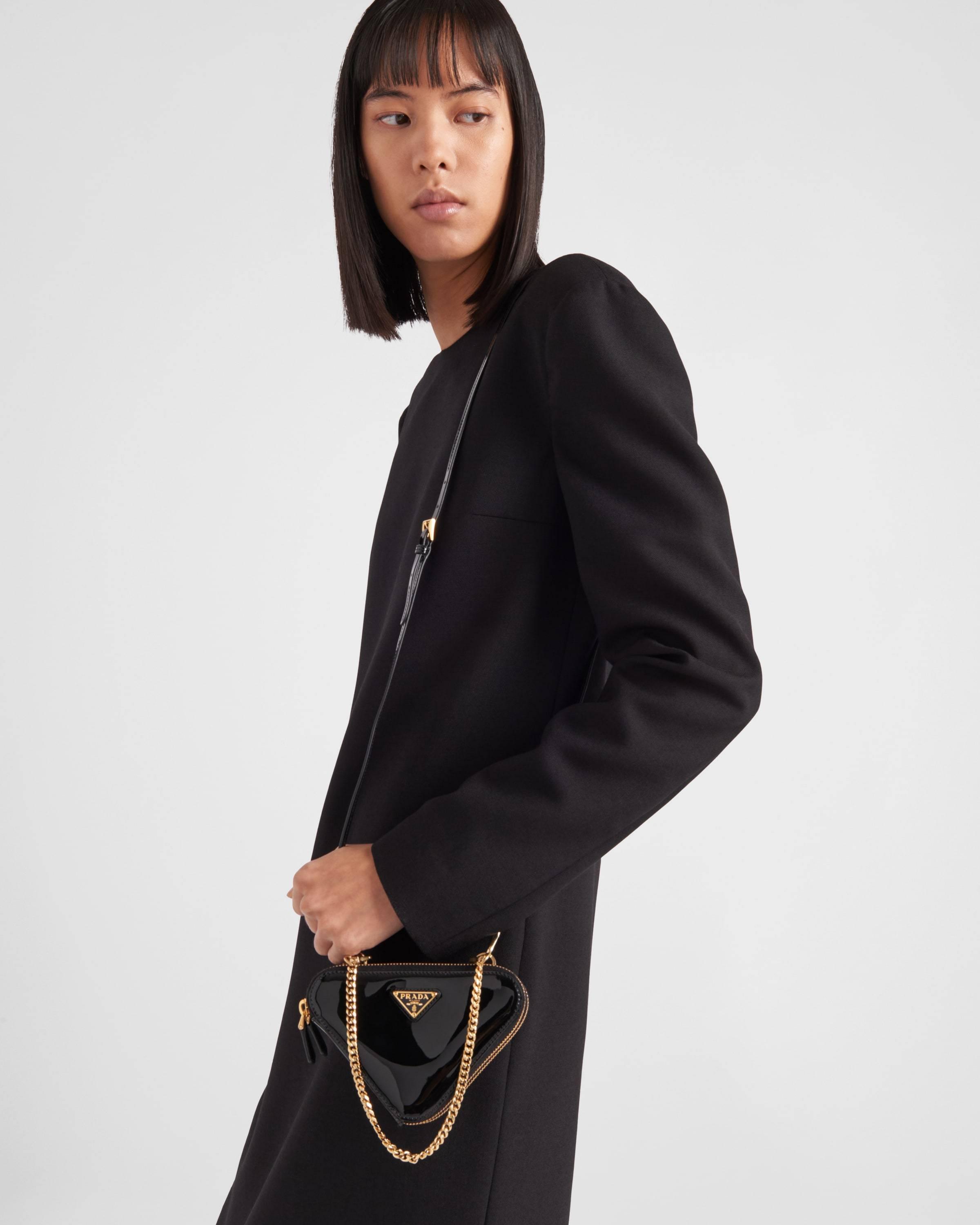 Prada Patent Leather Mini Pouch in White | Lyst