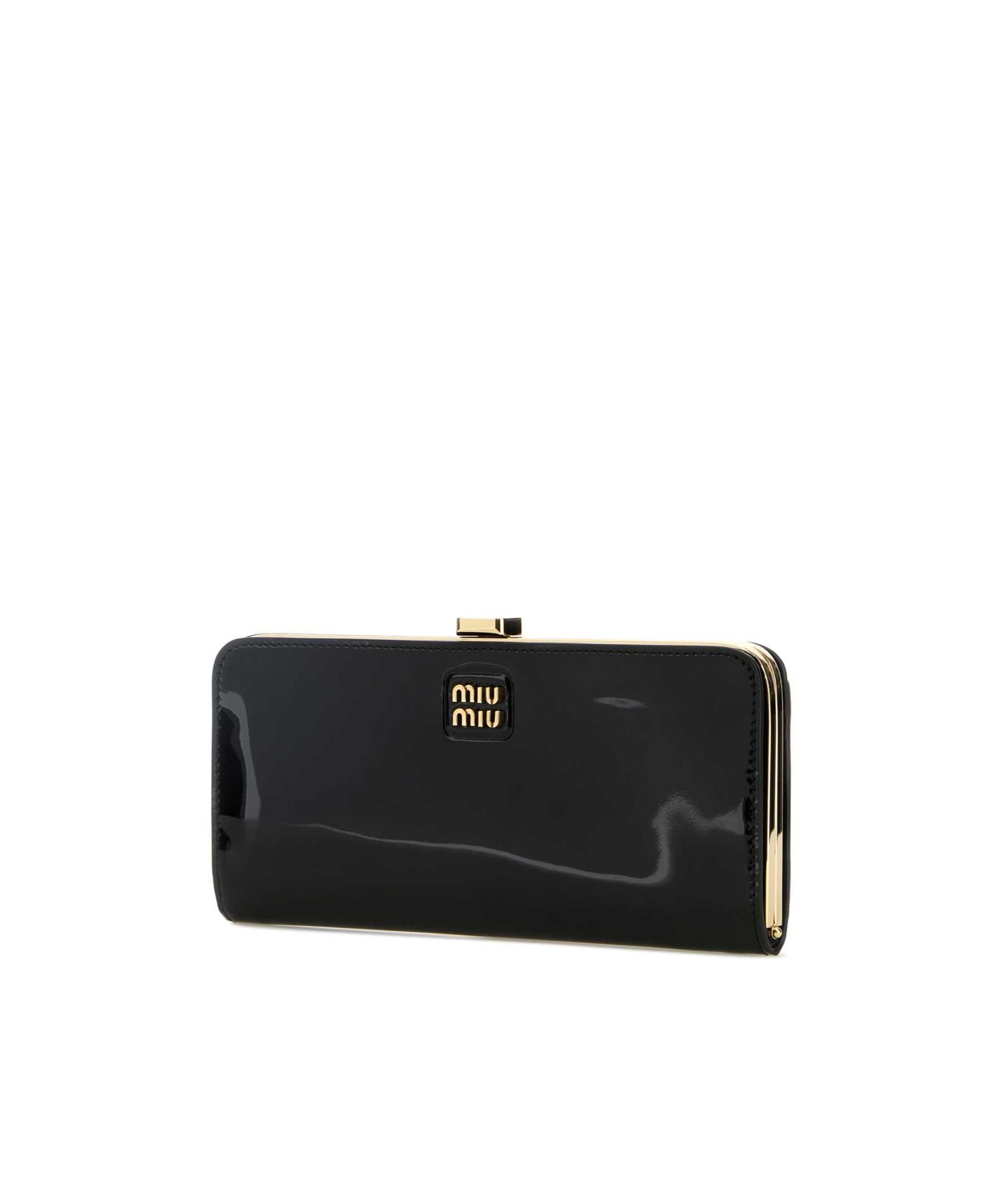 Miu Miu Leather Wallet in Black | Lyst