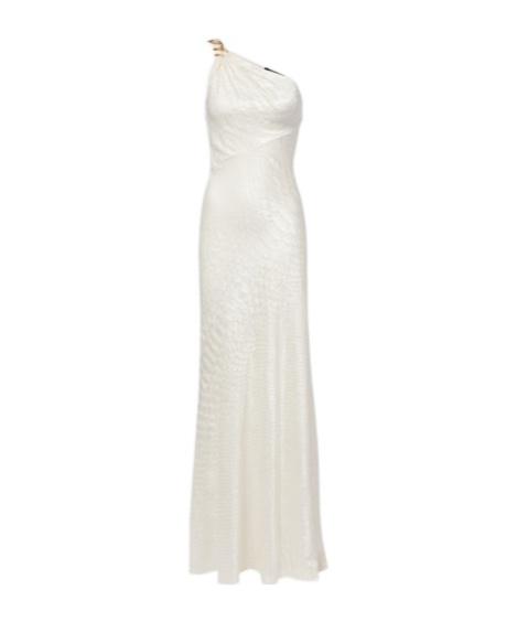 metal spine dress for sale The @roberto_cavalli's Metal Spine dress from Fall/Winter 2000 is an iconic piece known for its striking open-back design, originally modeled by @shirleymallmann on the runway. The dress features a double-headed gold reptilian