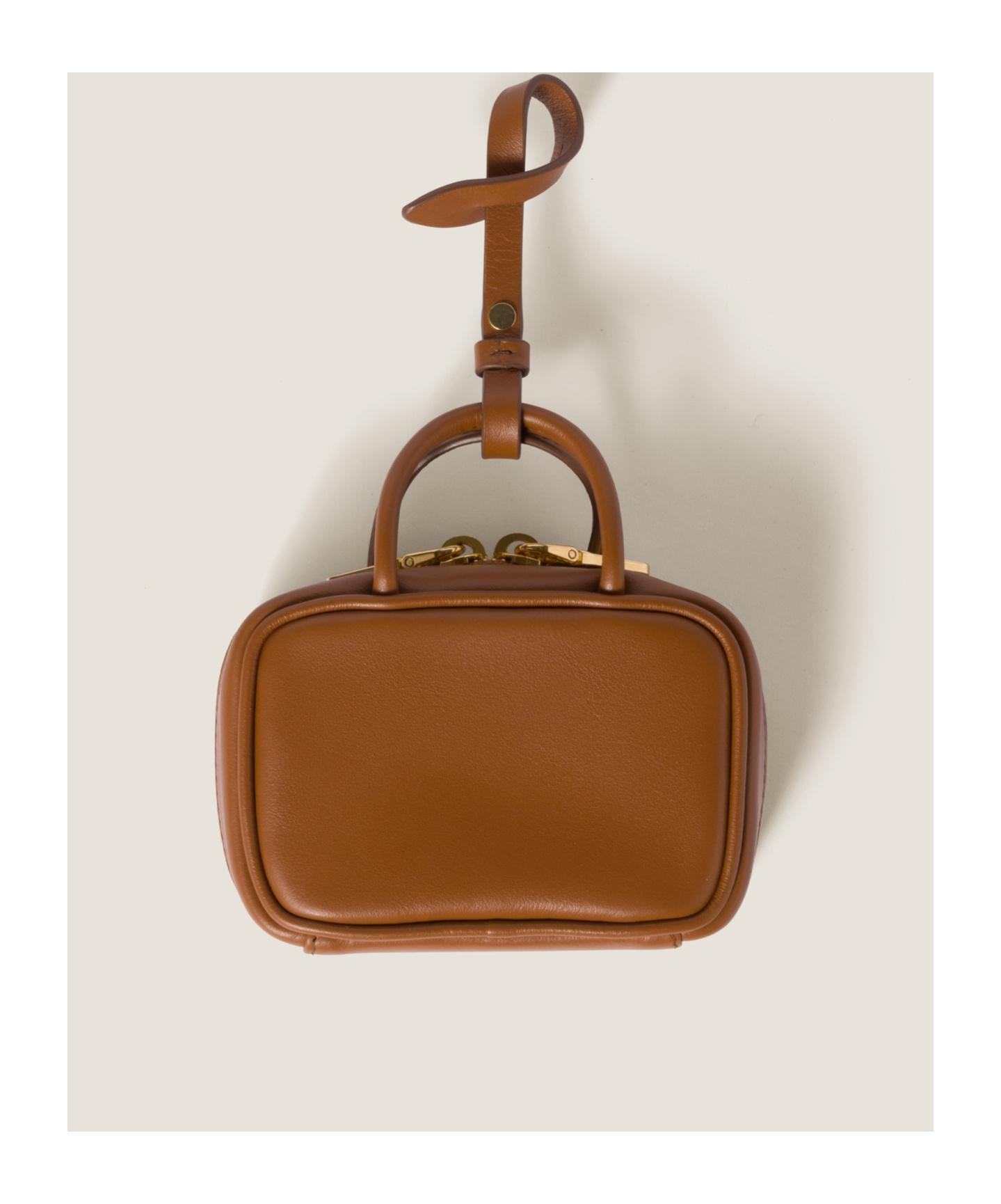 MIUMIU トリックキーリング ブラウン Miu Miu Logo-Embossed Trick Keychain in Brown | Lyst