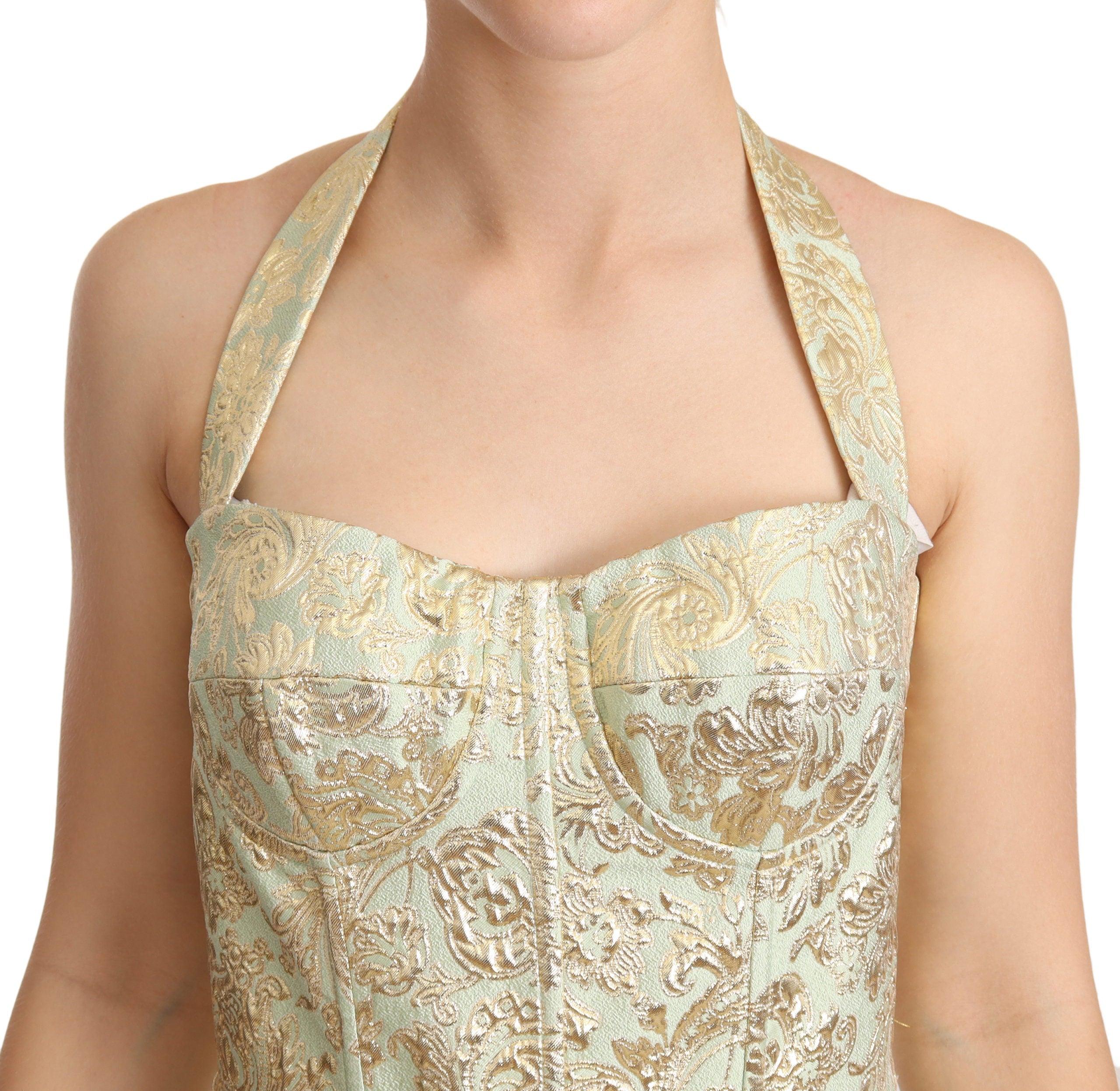 - Save 19% Dolce & Gabbana Silk Green Floral Jacquard Halter Midi Dress in Gold Womens Dresses Dolce & Gabbana Dresses Natural 