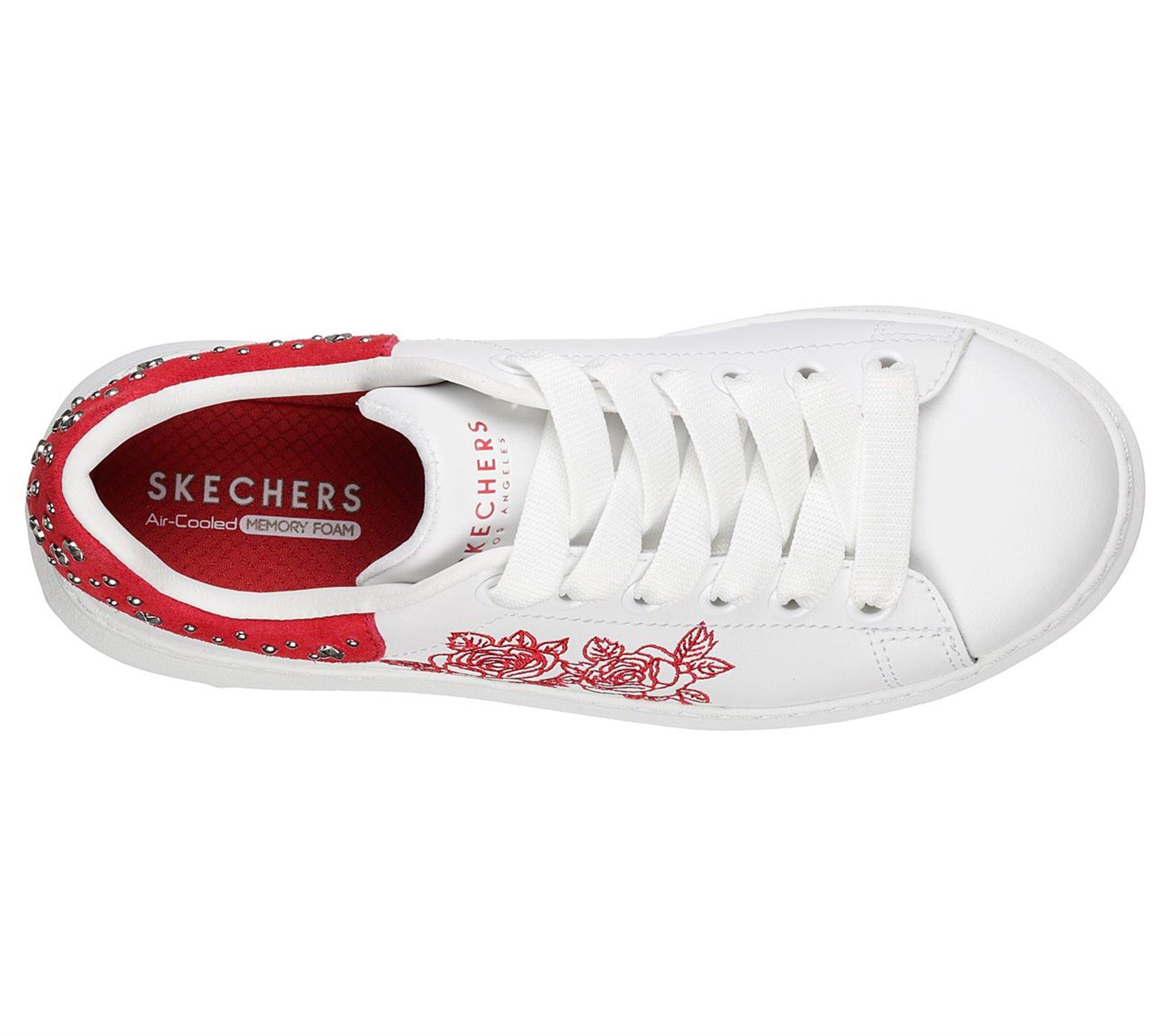 white skechers with roses