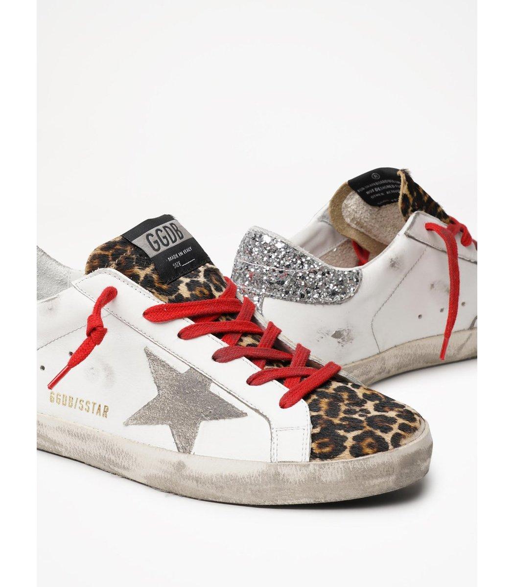 golden goose with red star