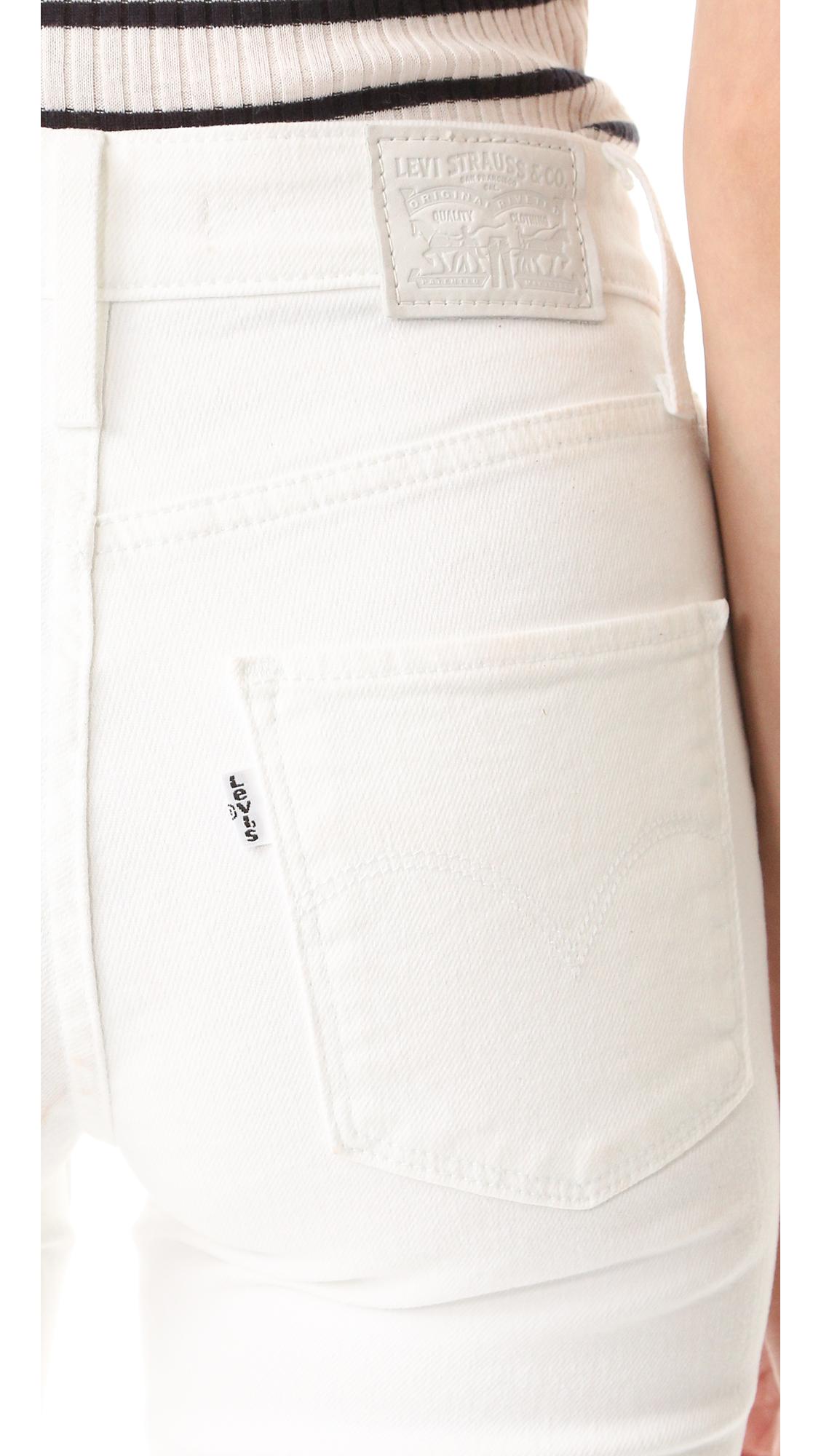 721 high rise skinny jeans white