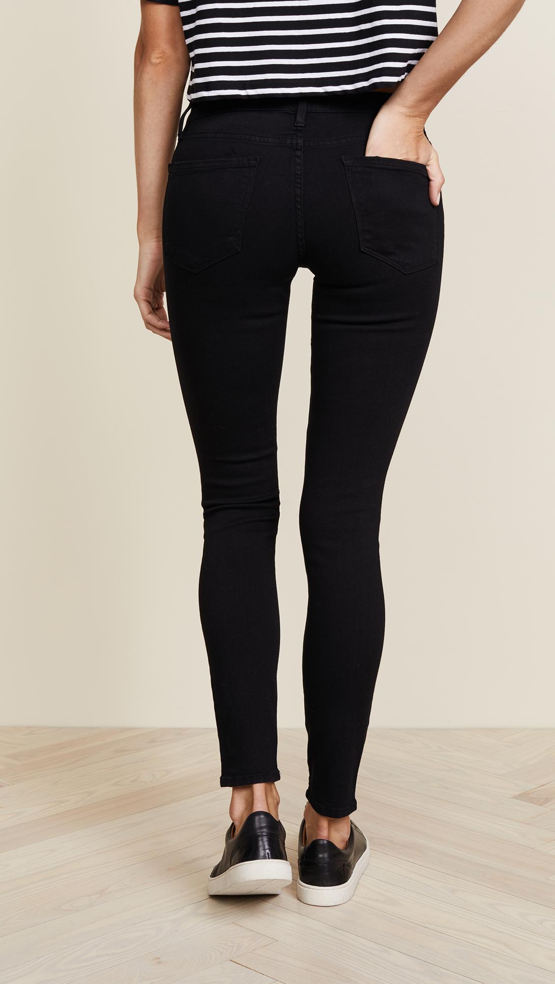FRAME Le Color Rip Skinny Jeans in Black | Lyst