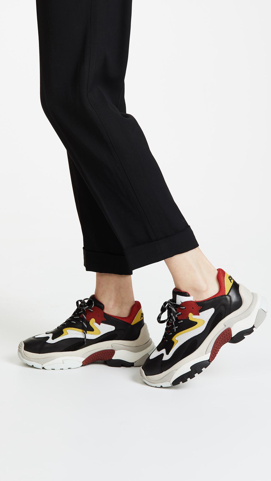 ash addict white trainers