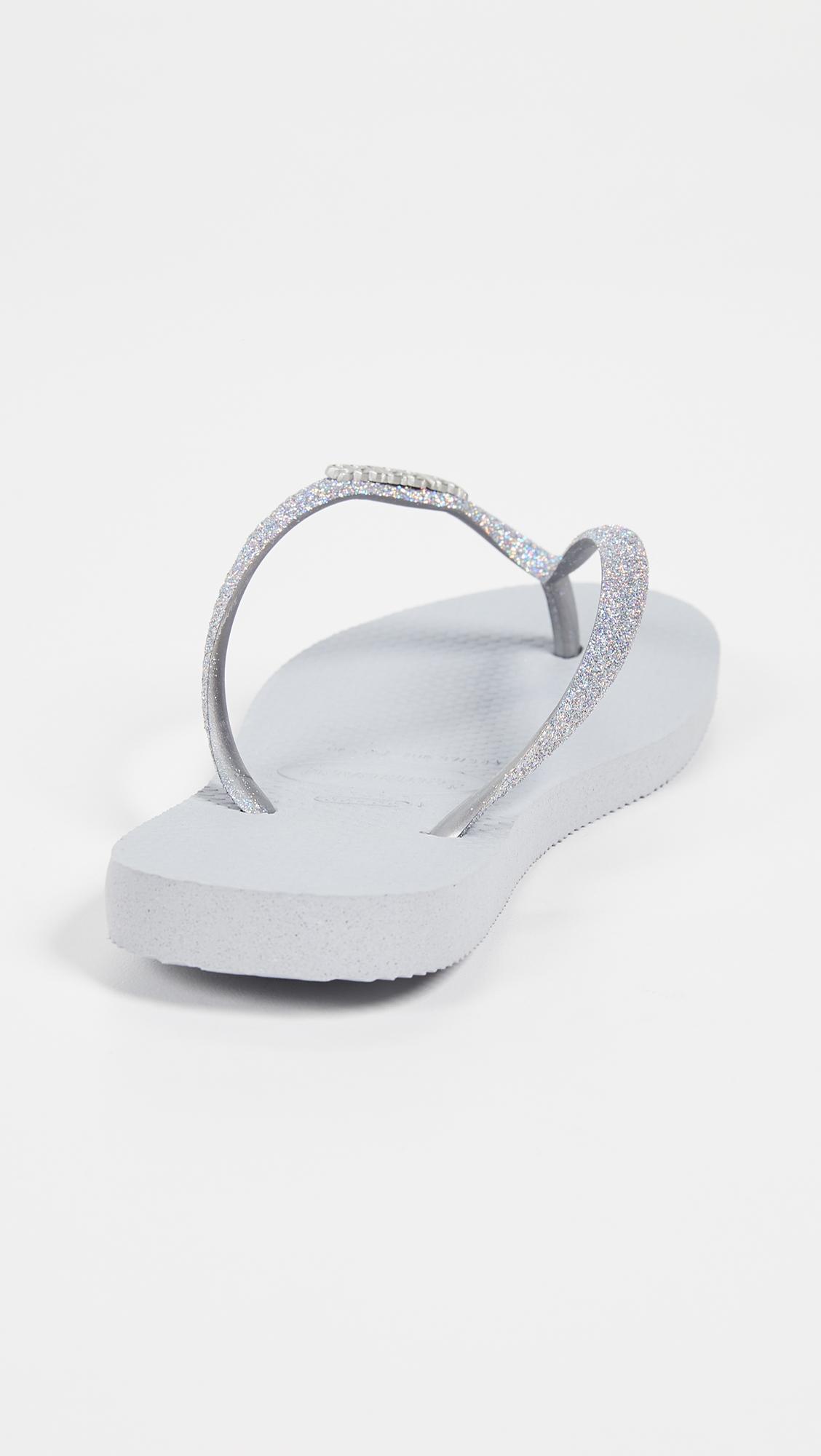 Save 31% Womens Shoes Flats and flat shoes Sandals and flip-flops Havaianas Hav Slim Glitter Grey Flip-flop in Metallic 