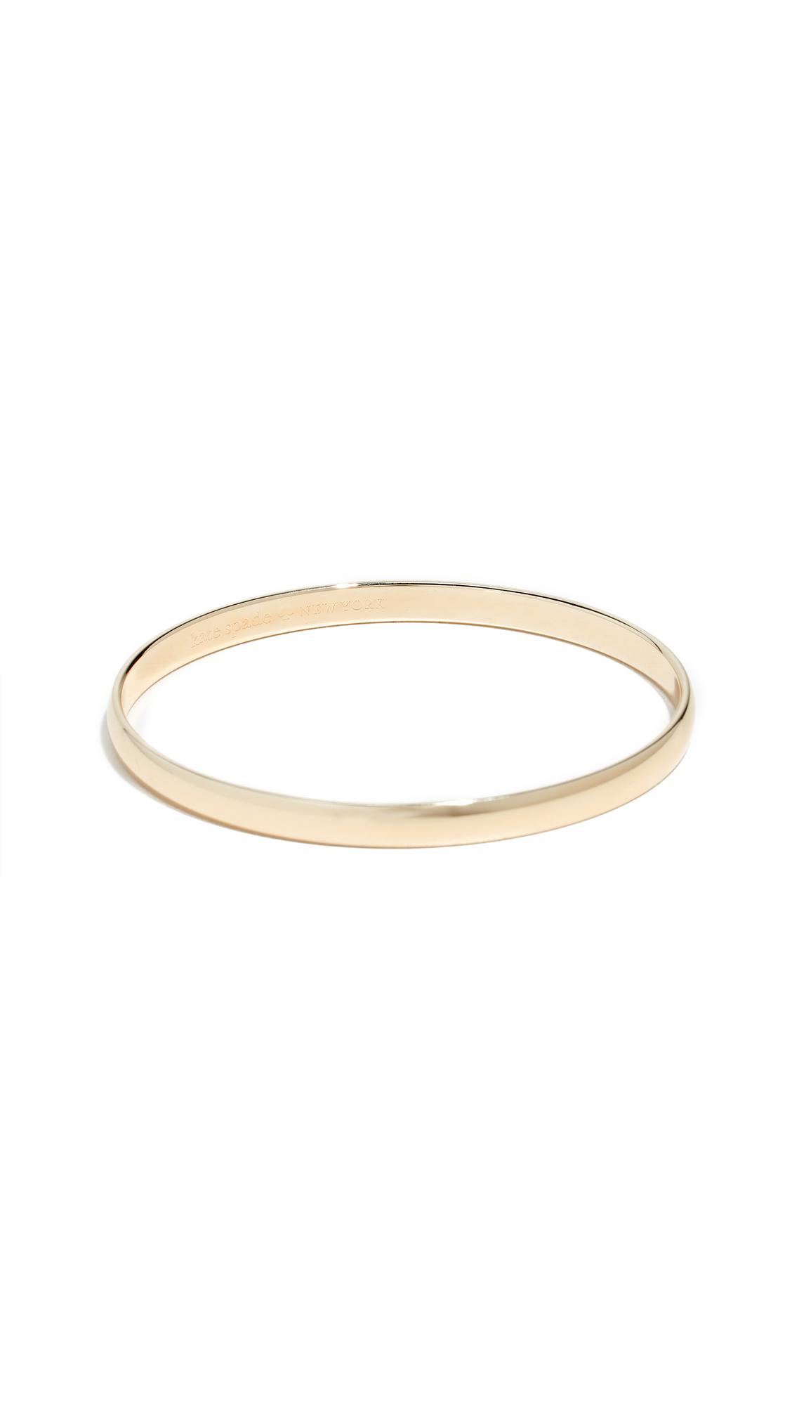 Kate Spade Heart Of Gold Idiom Bangle In Yellow Gold Metallic Lyst 4117