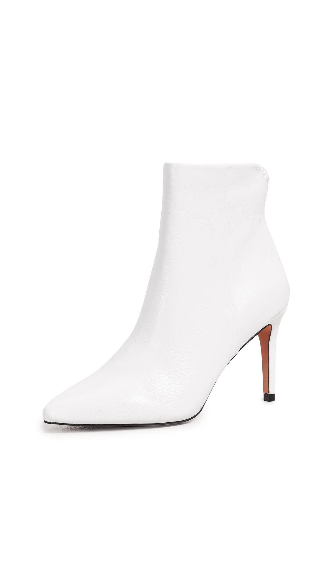 white pointed toe booties