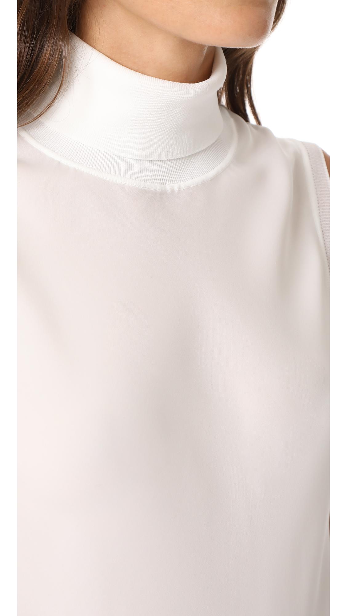 white turtleneck top sleeveless