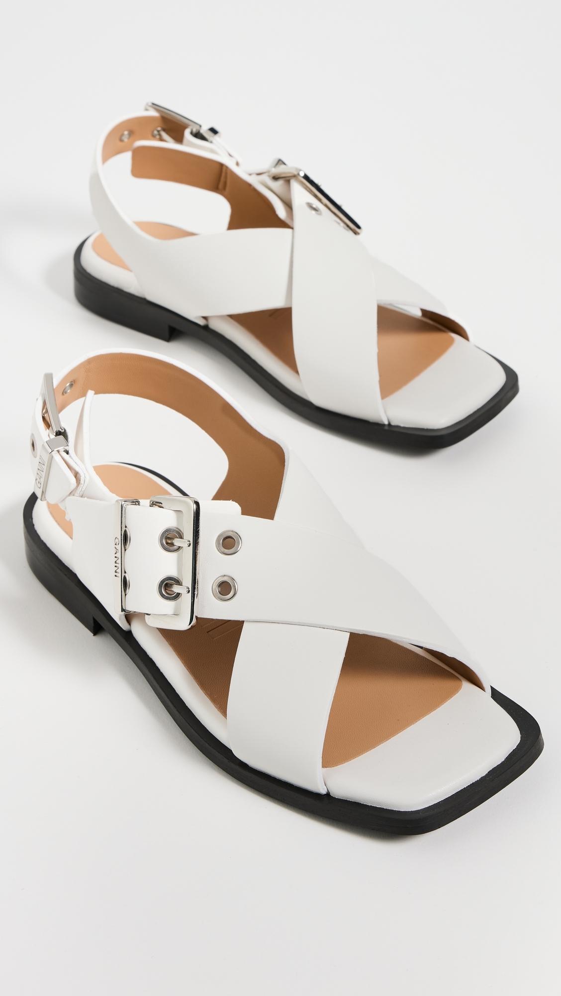 Ganni Buckle Cross Strap Sandals in Black | Lyst
