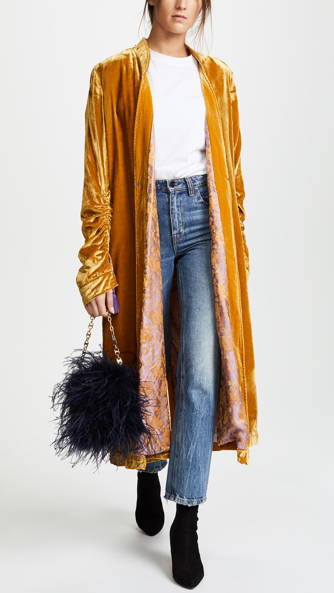 tory burch feather bag