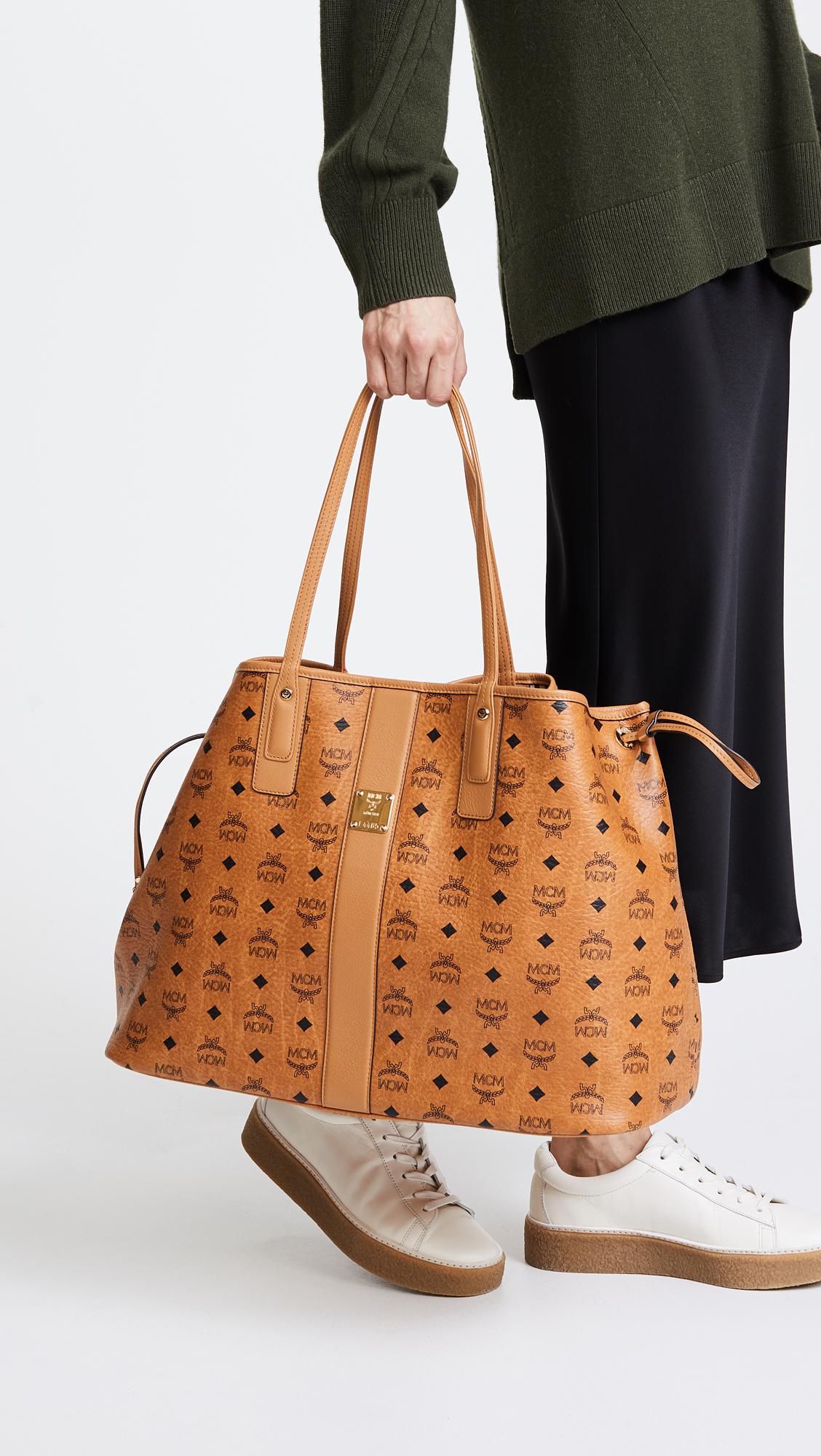 Mcm large wristlet sales