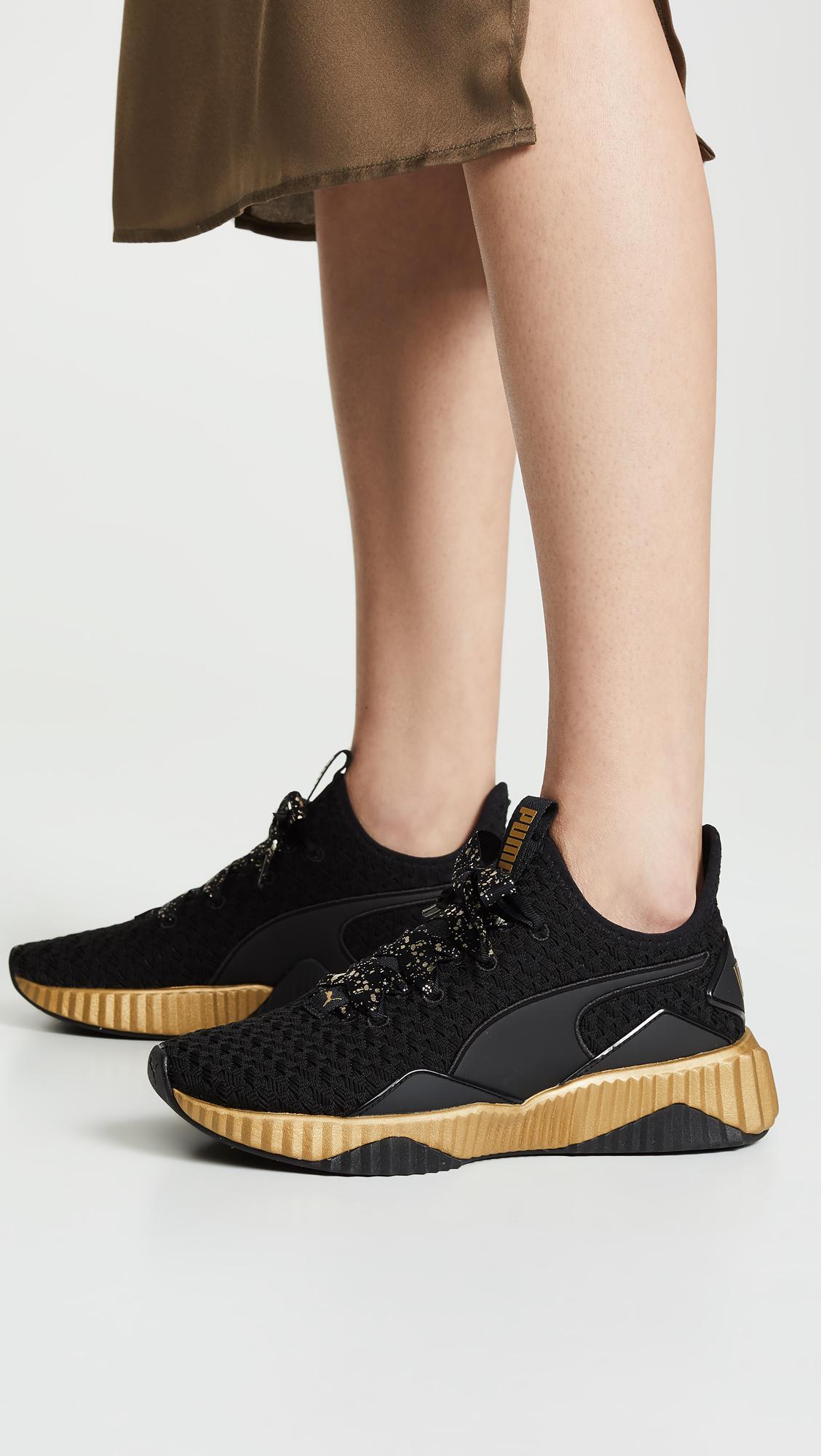 PUMA Defy Sparkle Sneakers in Black - Lyst