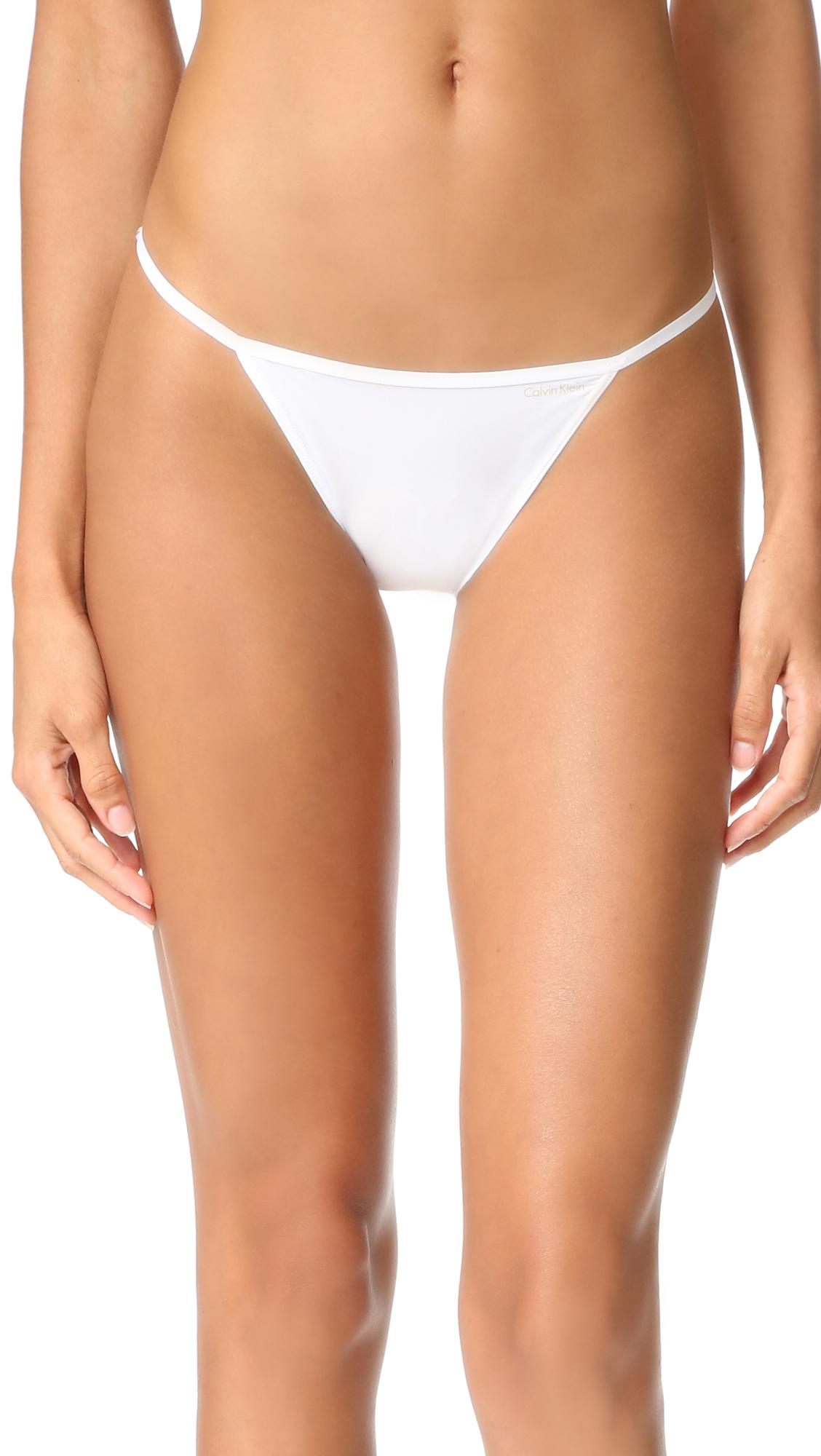 Calvin Klein Sleek String Bikini Panties in White | Lyst
