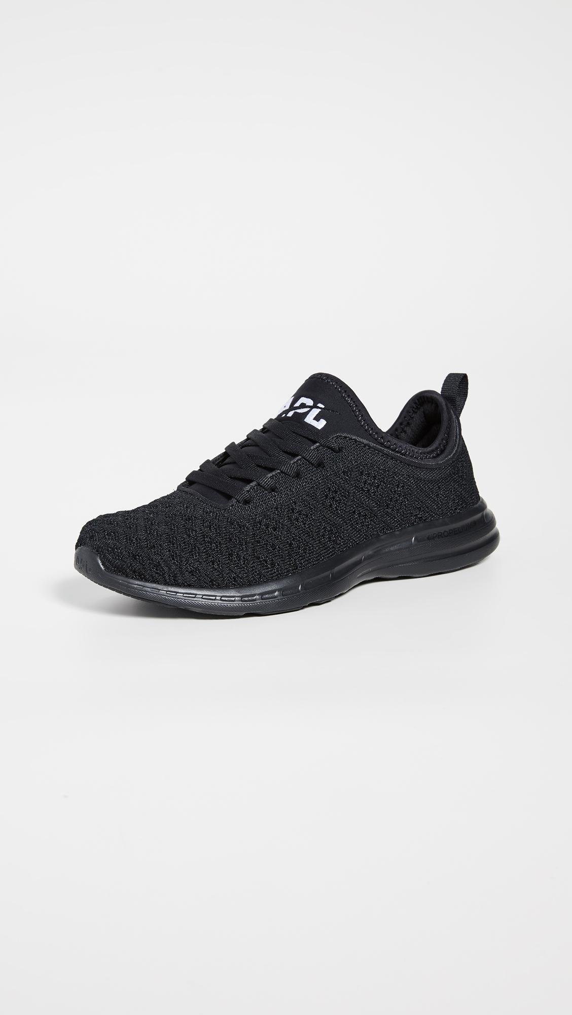 black apl sneakers