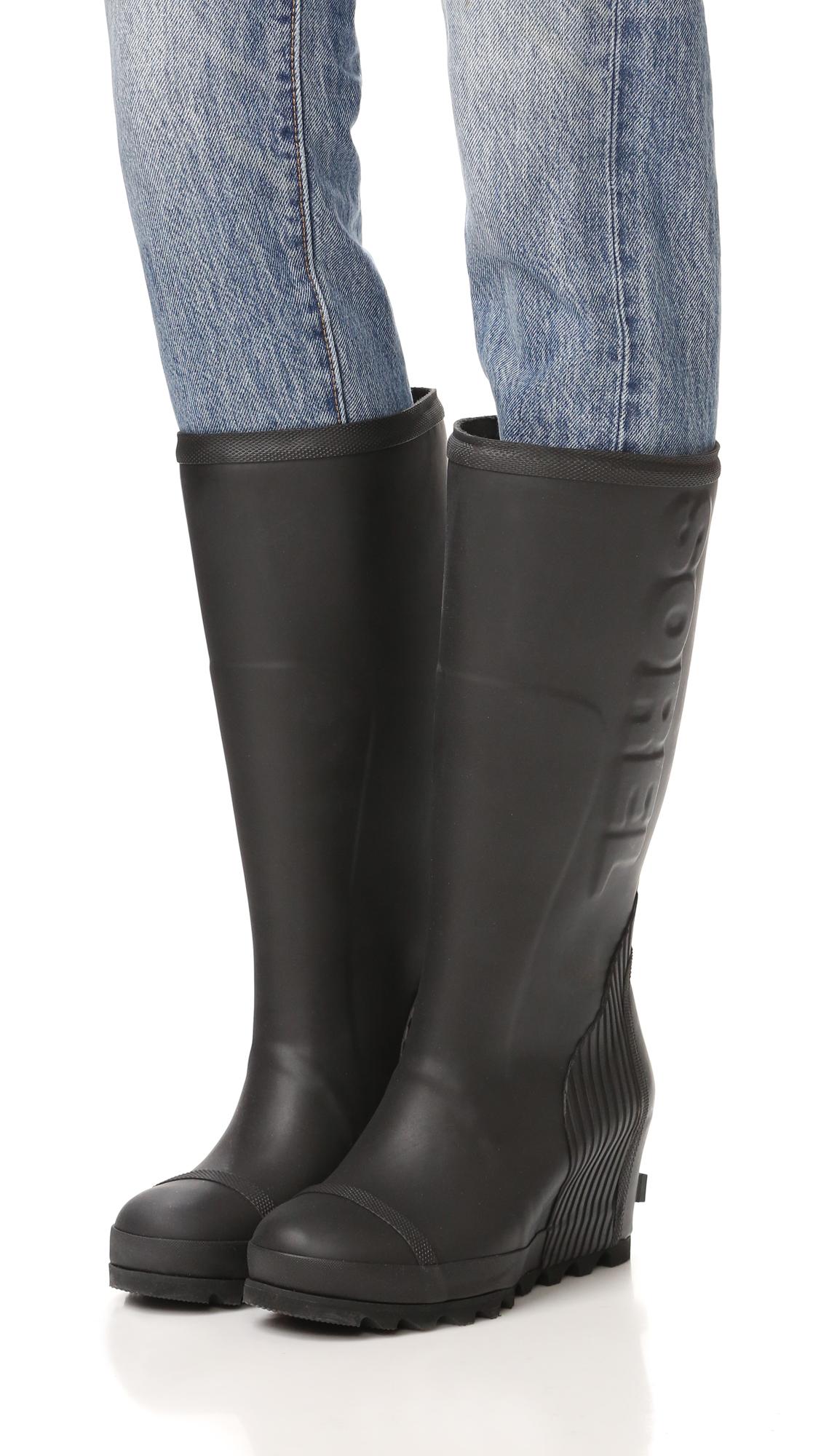 Sorel Rubber Joan Tall Rain Wedge Boots in Black - Lyst