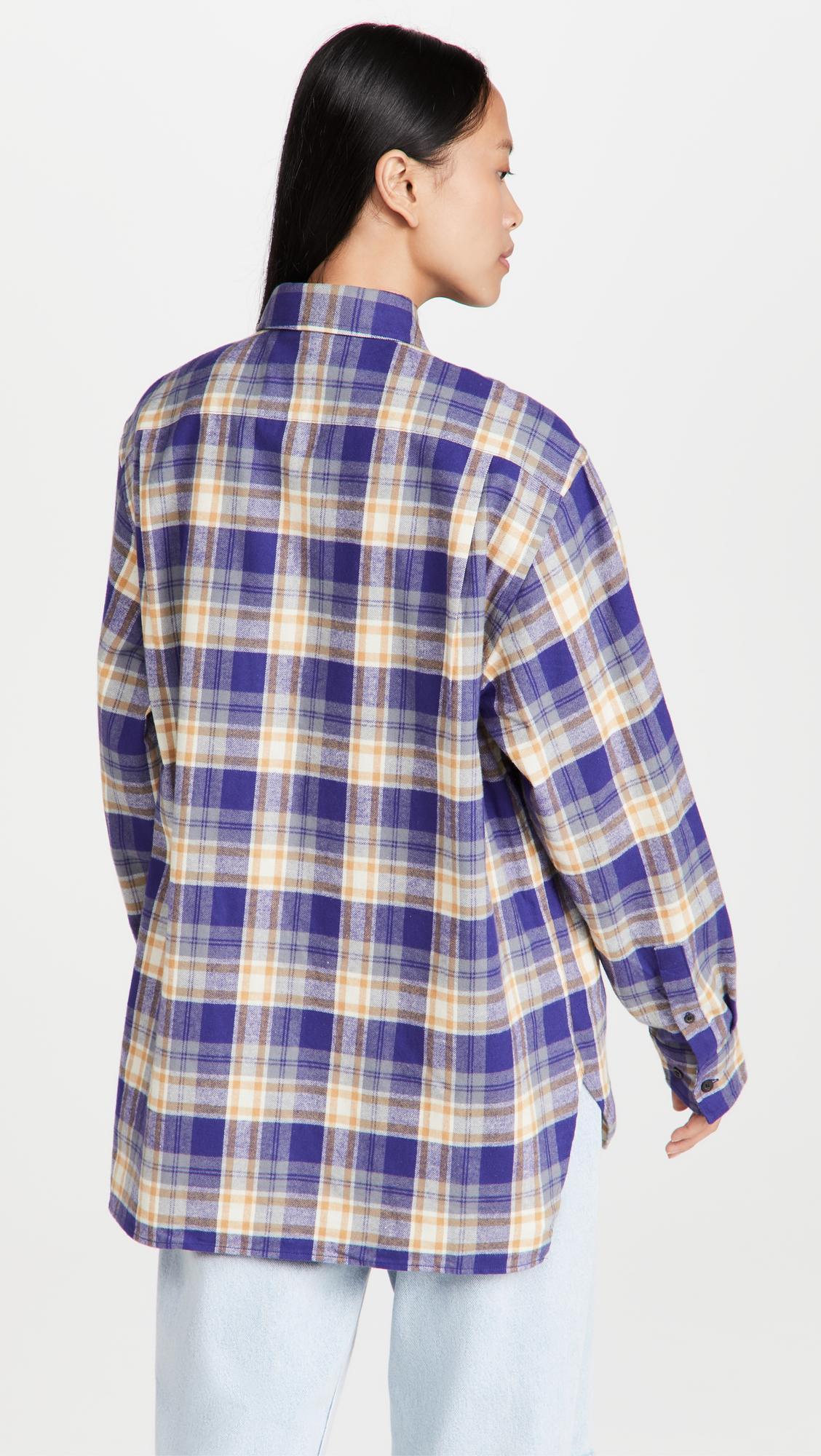 purple and yellow plaid shirt