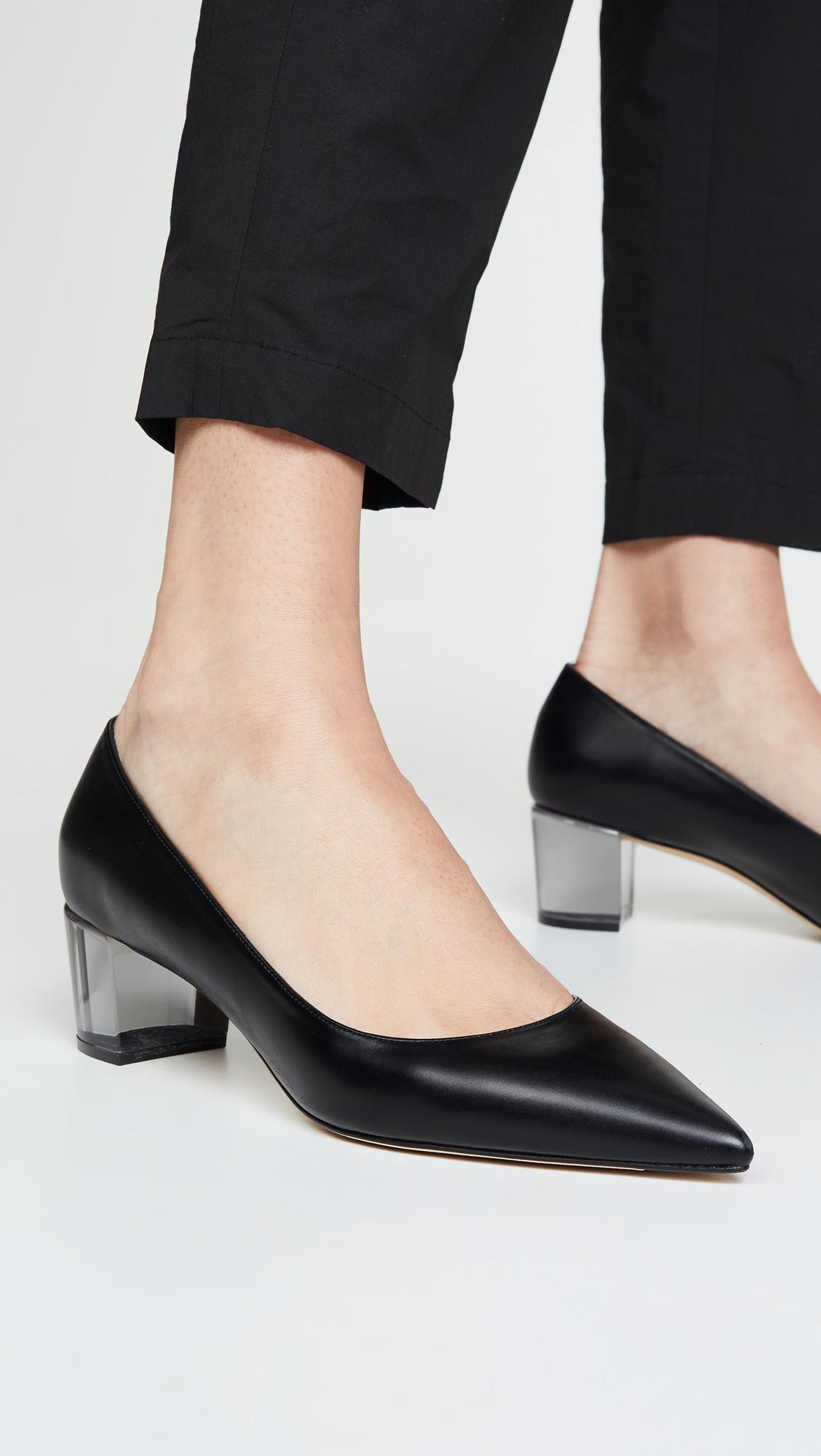 stuart weitzman patent leather pumps