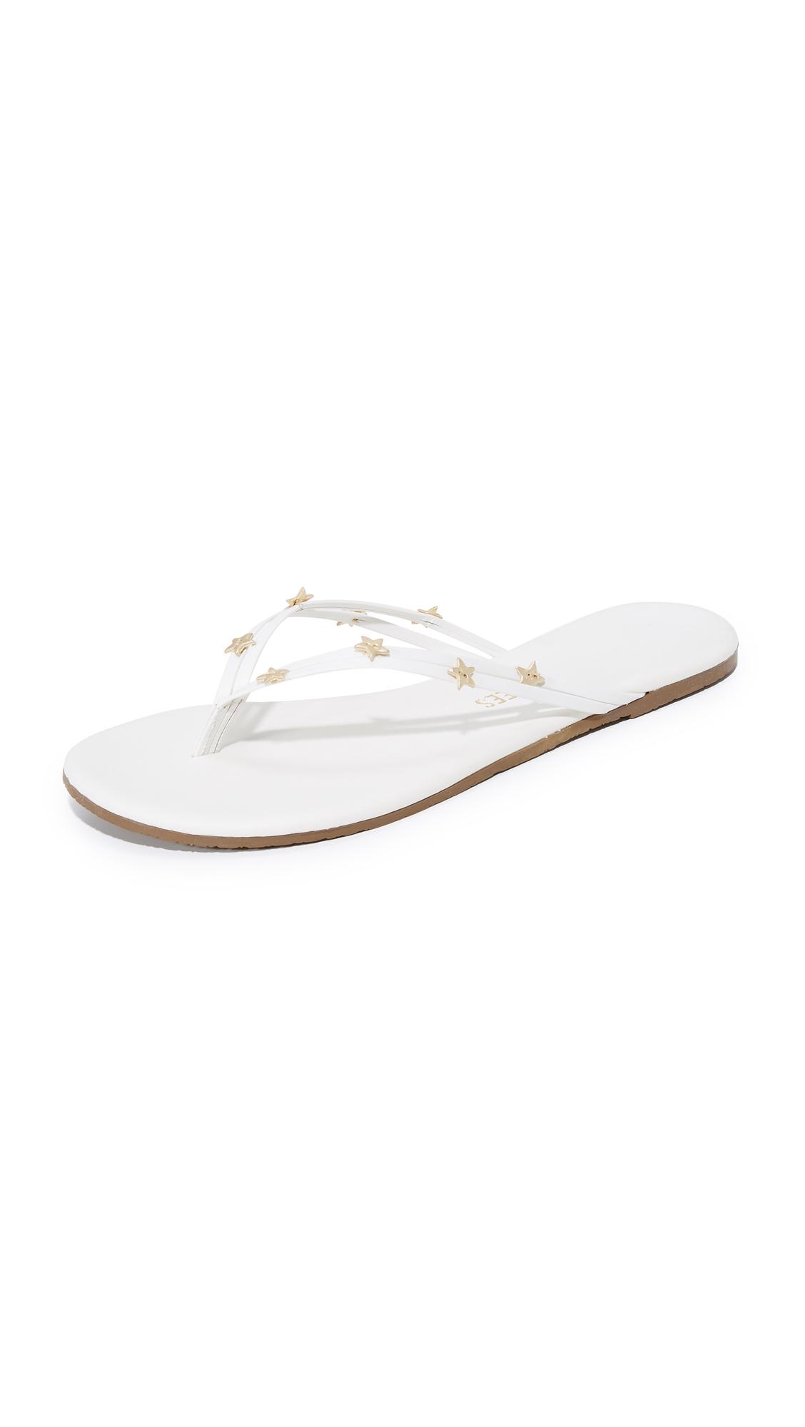 tkees white flip flops