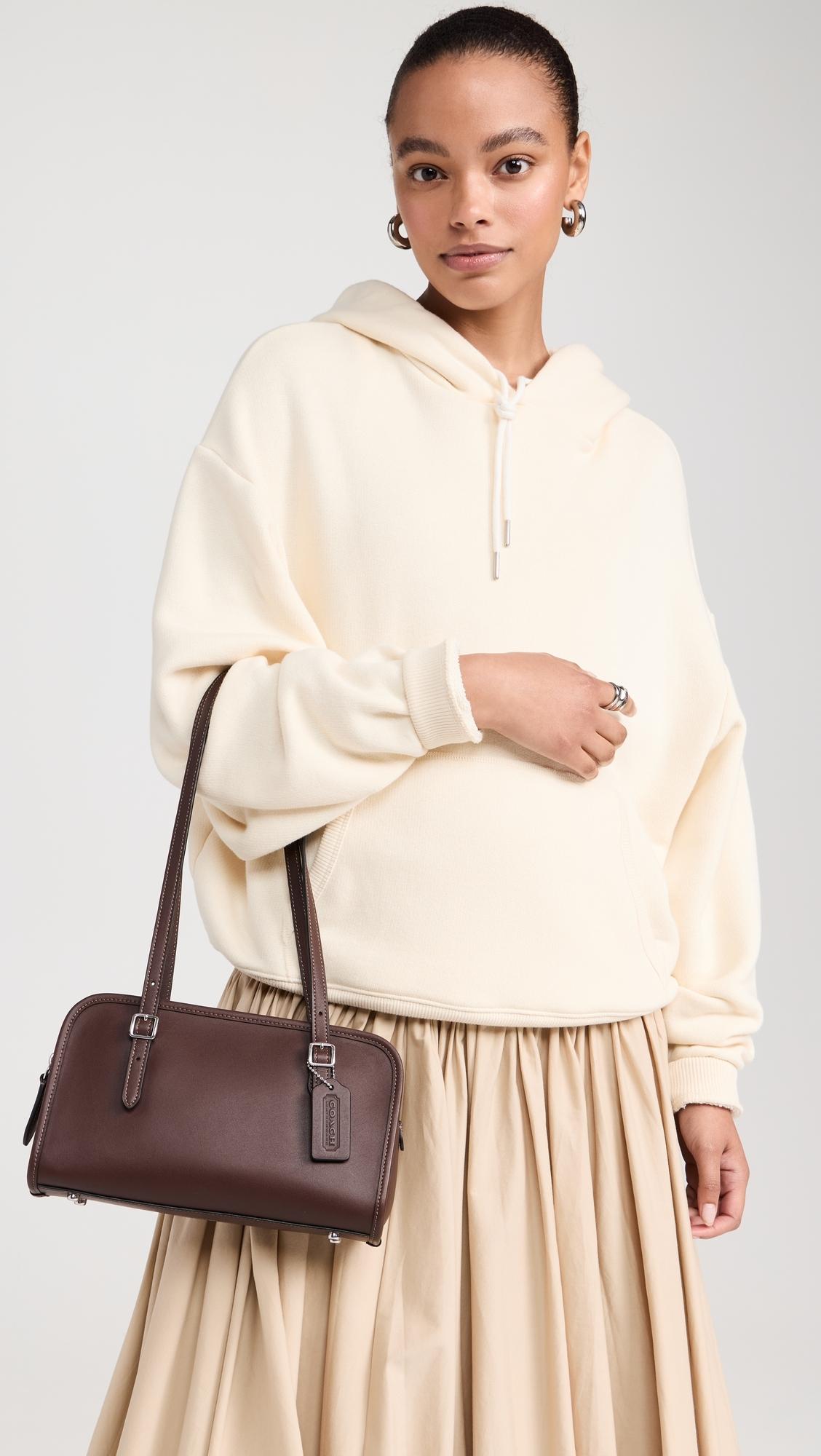 COACH Swing Zip Bag in Brown | Lyst COACH Swing Zip Bag in Brown | Lyst