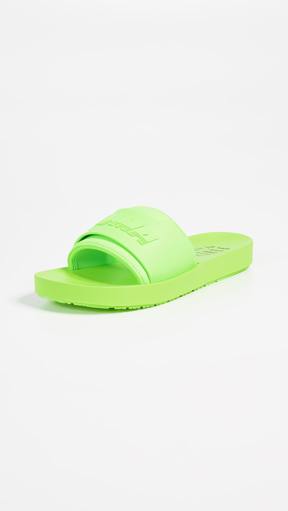 neon green puma slides
