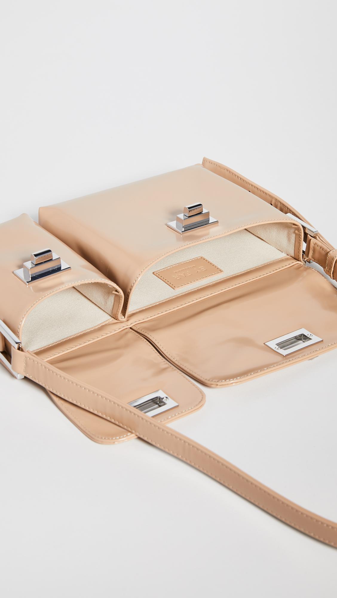 cream patent bag