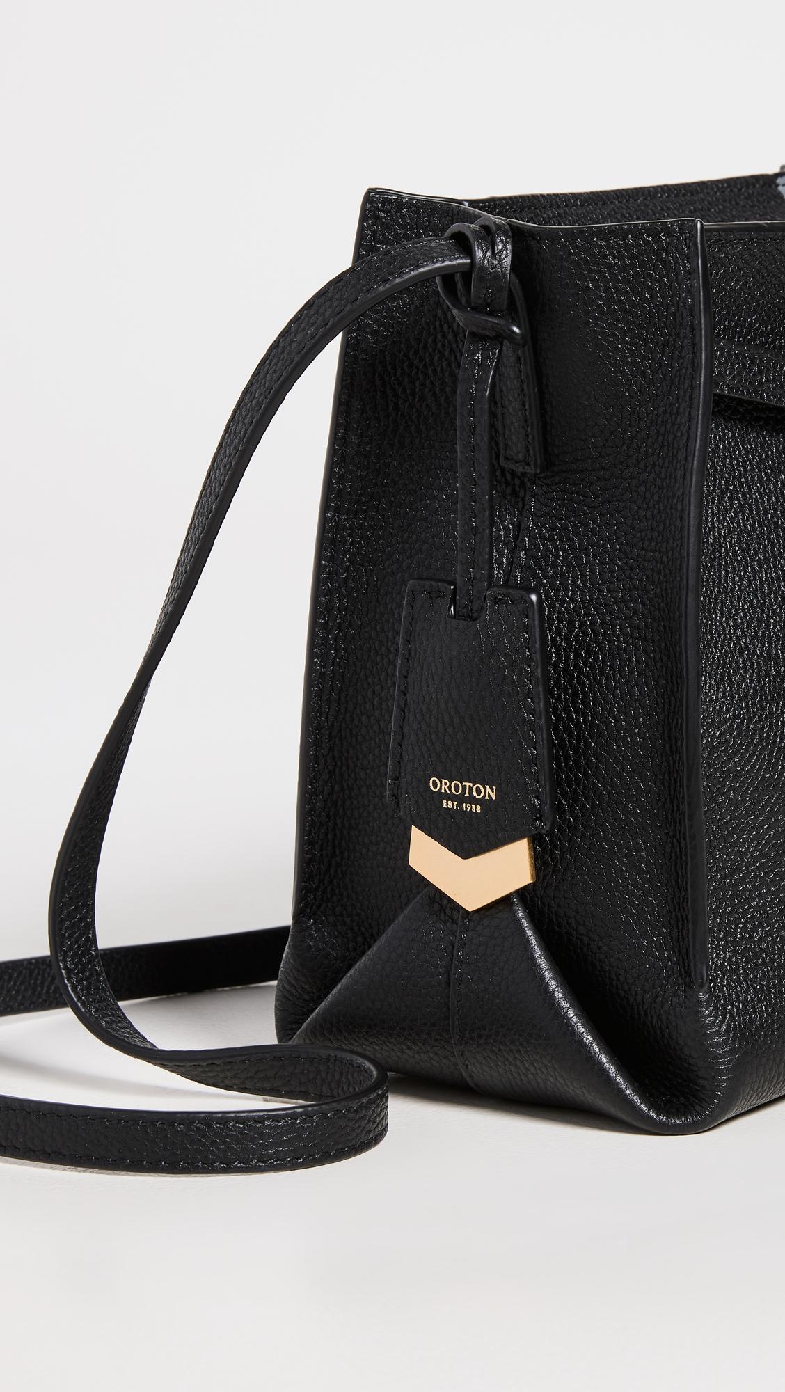 Oroton Margot Mini Bucket Bag in Black | Lyst