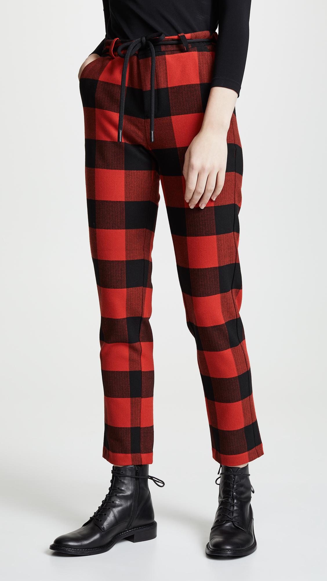 Красные клетчатые брюки. Штаны в клетку женские. Штаны adidas gabba. Красные штаны женские. Штаны найк красный камуфляж.